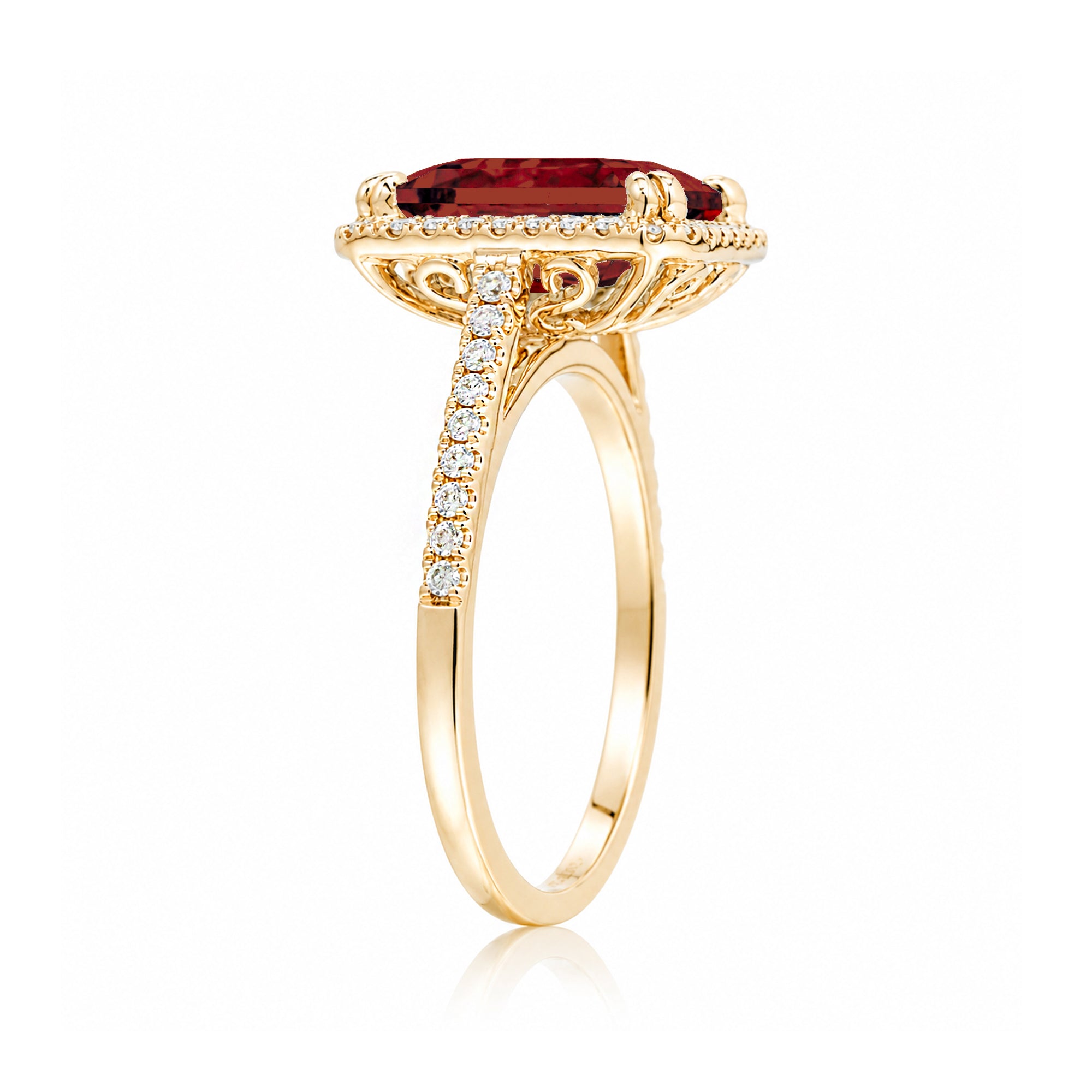 Emerald step cut ruby halo ring with a squarish band and cathedral setting yellow gold