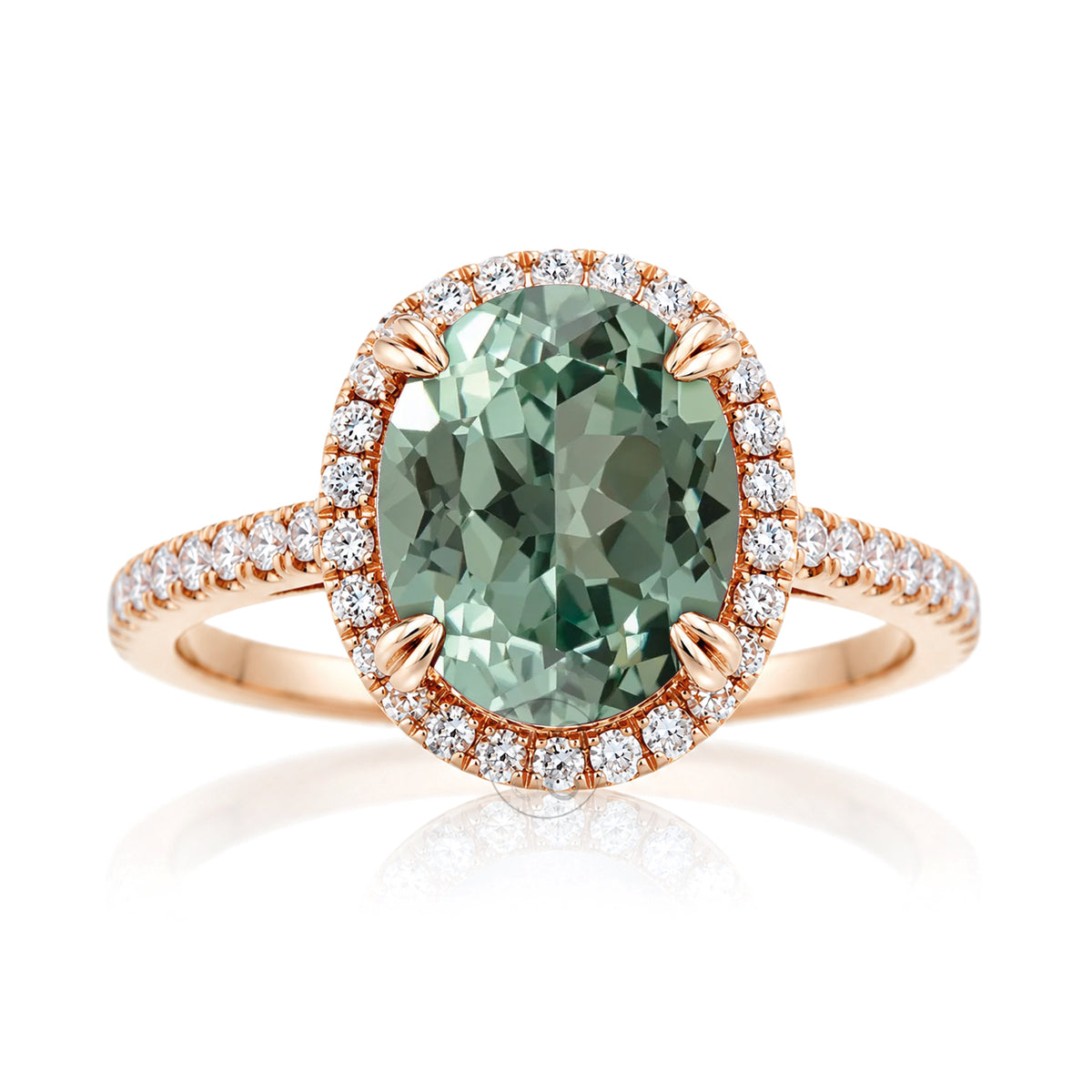 Oval green sapphire engagement ring with diamond halo in rose gold