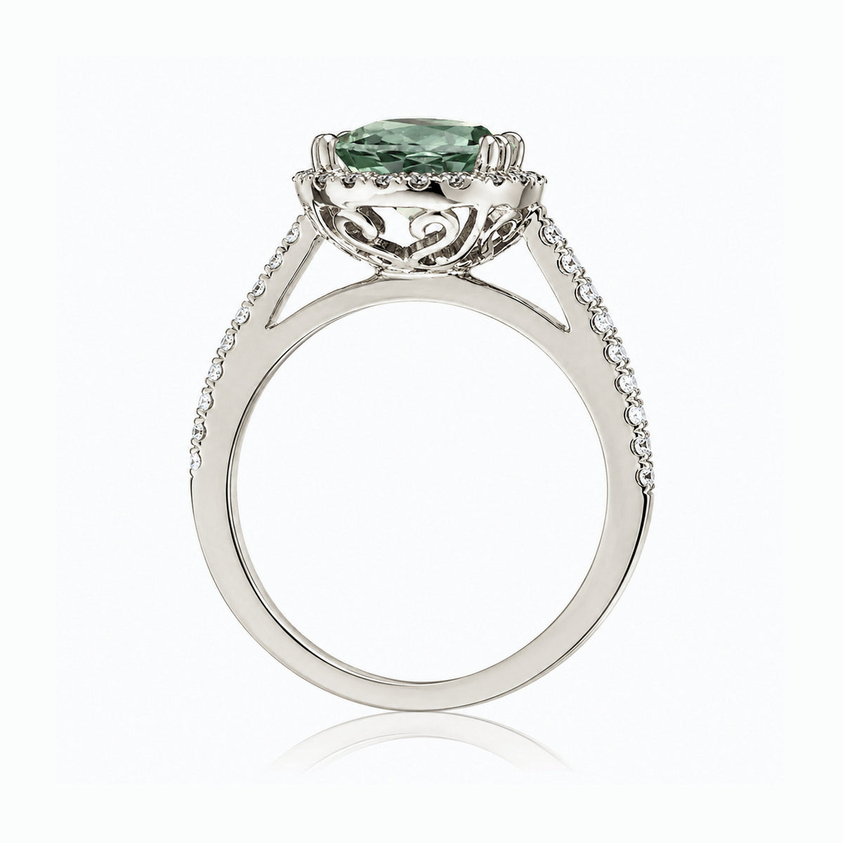 Oval green sapphire engagement ring with diamond halo in white gold