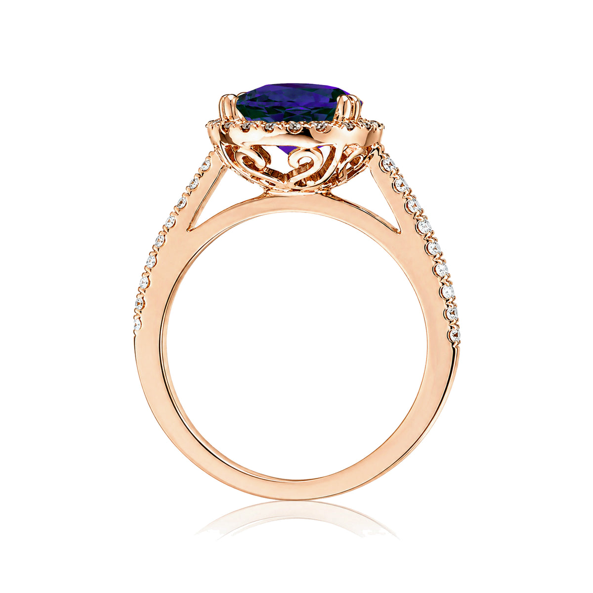 Pear cut blue sapphire ring with a diamond halo square band in a rose gold cathedral setting