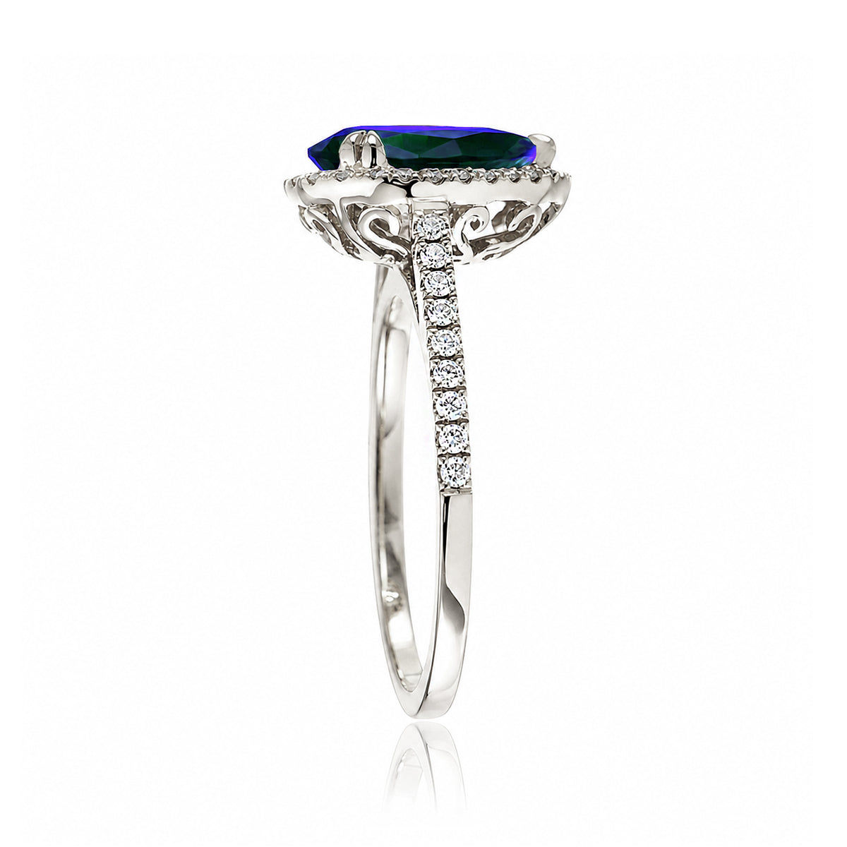 Pear cut blue sapphire ring with a diamond halo square band in a white gold cathedral setting