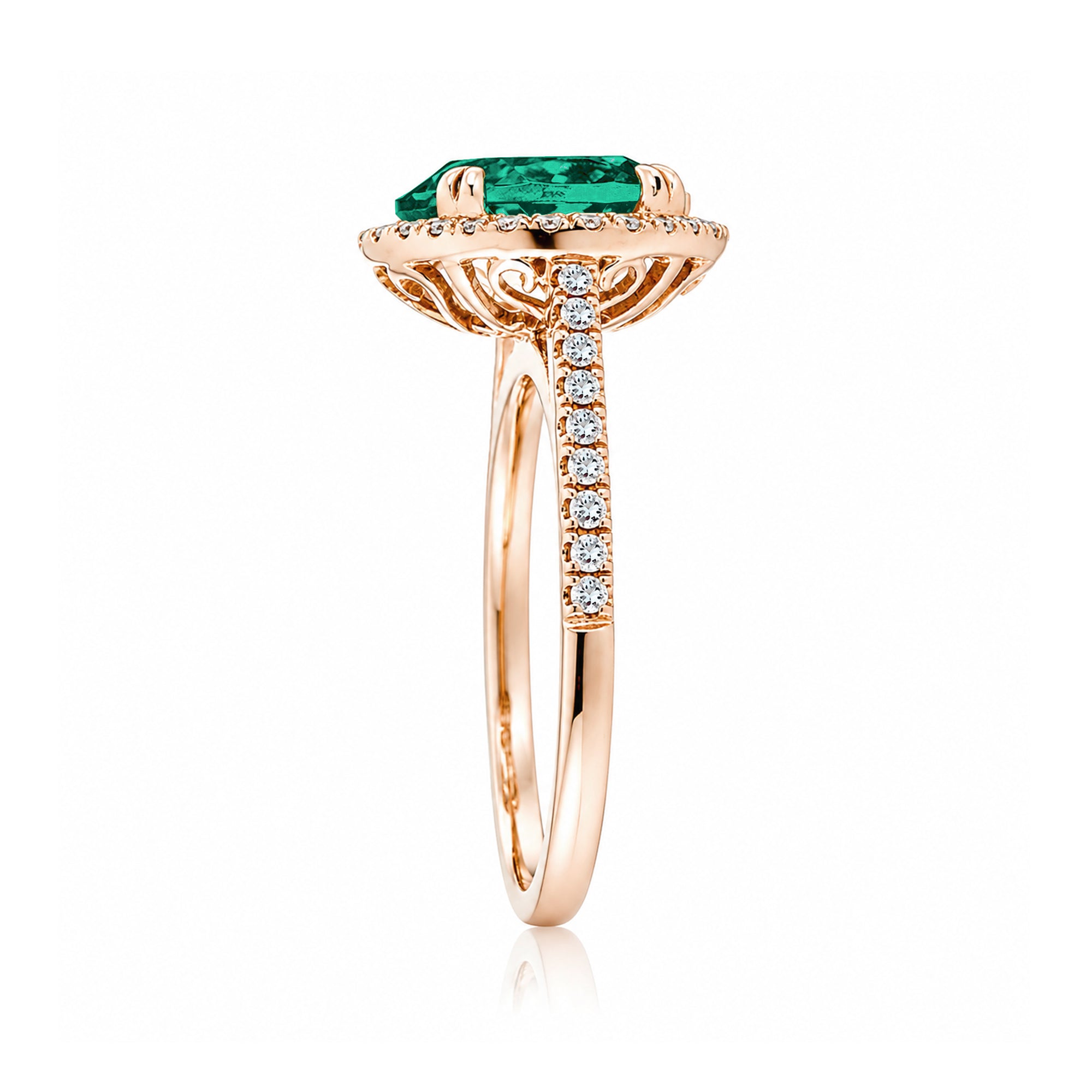Round emerald diamond halo ring with squarish diamond band rose gold