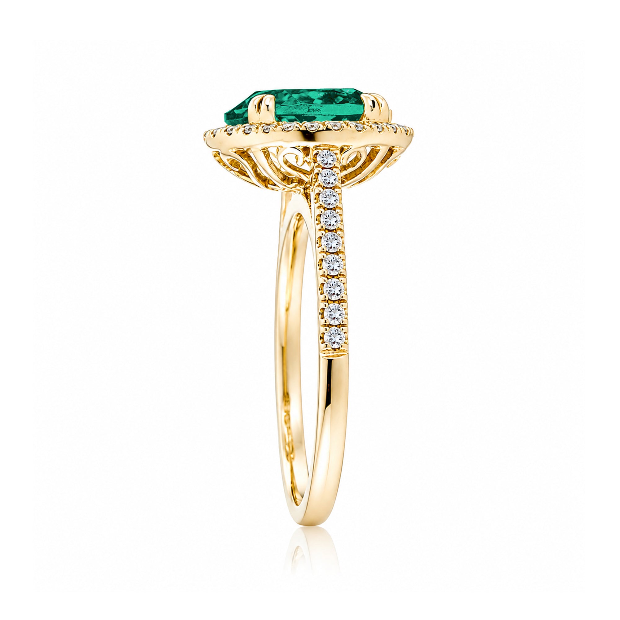 Round emerald diamond halo ring with squarish diamond band yellow gold
