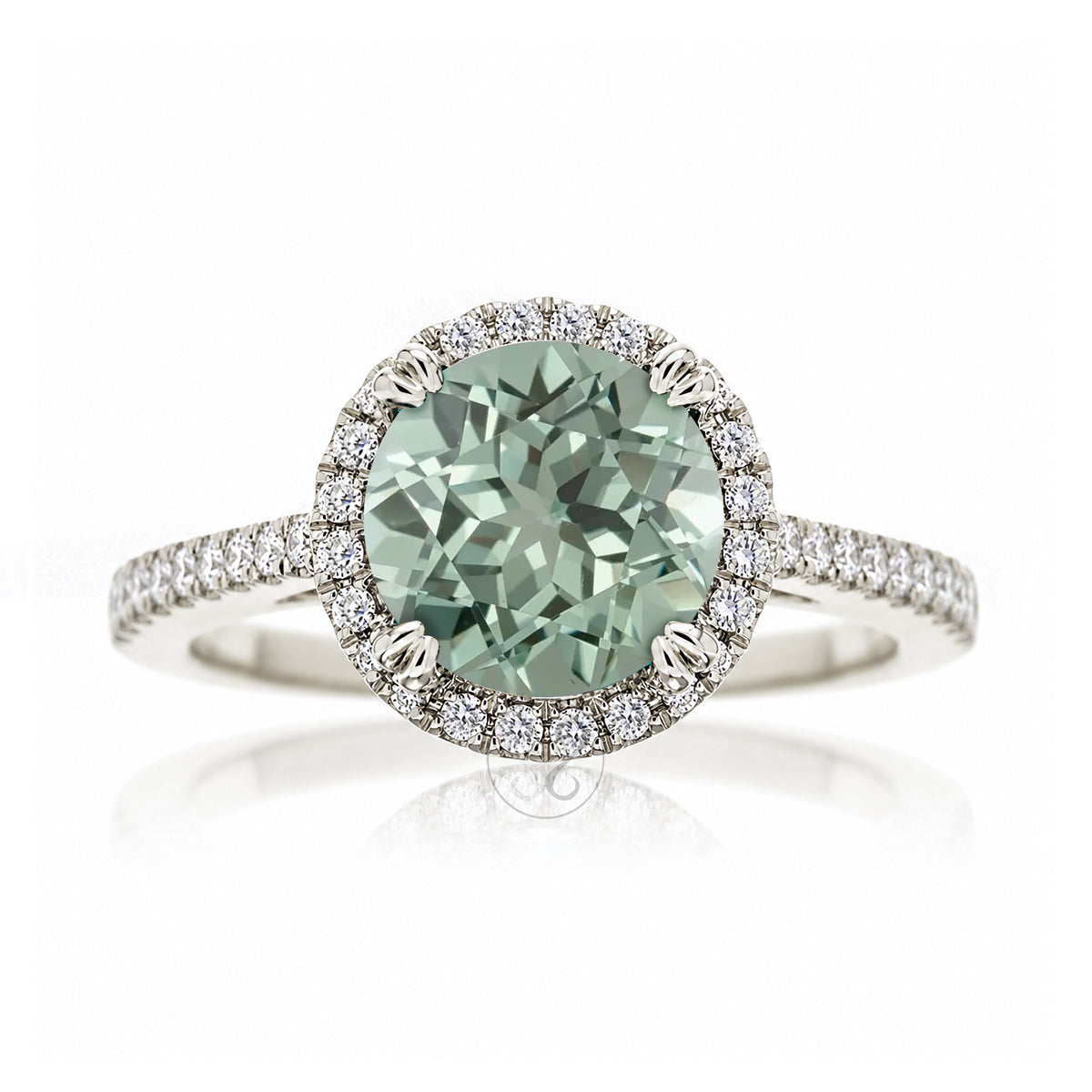 Round green sapphire diamond halo ring with squarish diamond band white gold
