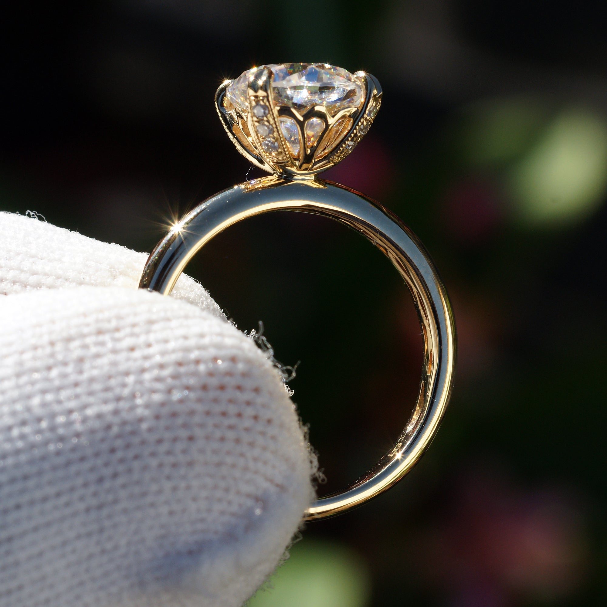 Cushion cut moissanite solitaire engagement ring in yellow gold The Leila side view