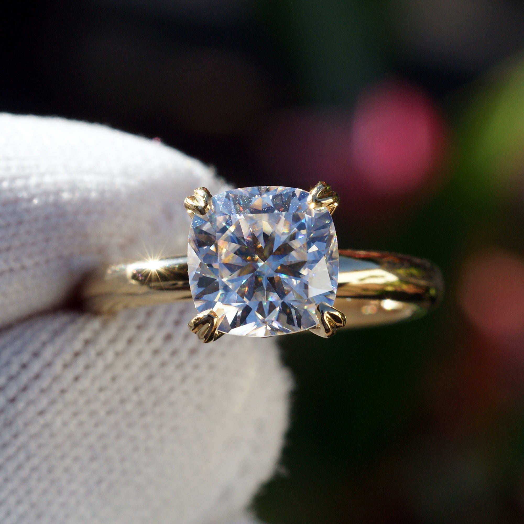 Cushion cut moissanite solitaire engagement ring in yellow gold The Leila top view