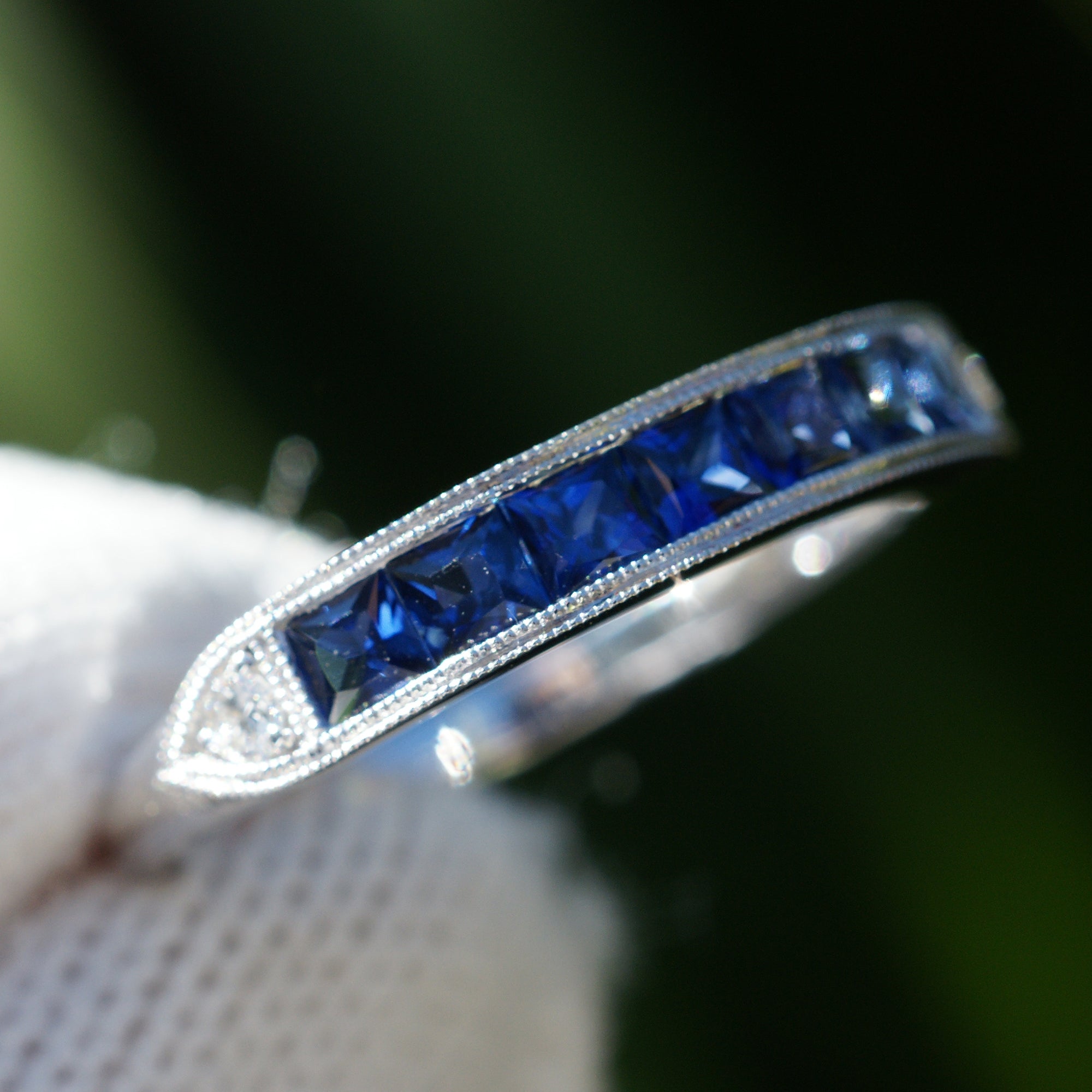 Channel set blue sapphire wedding anniversary band vintage style white gold