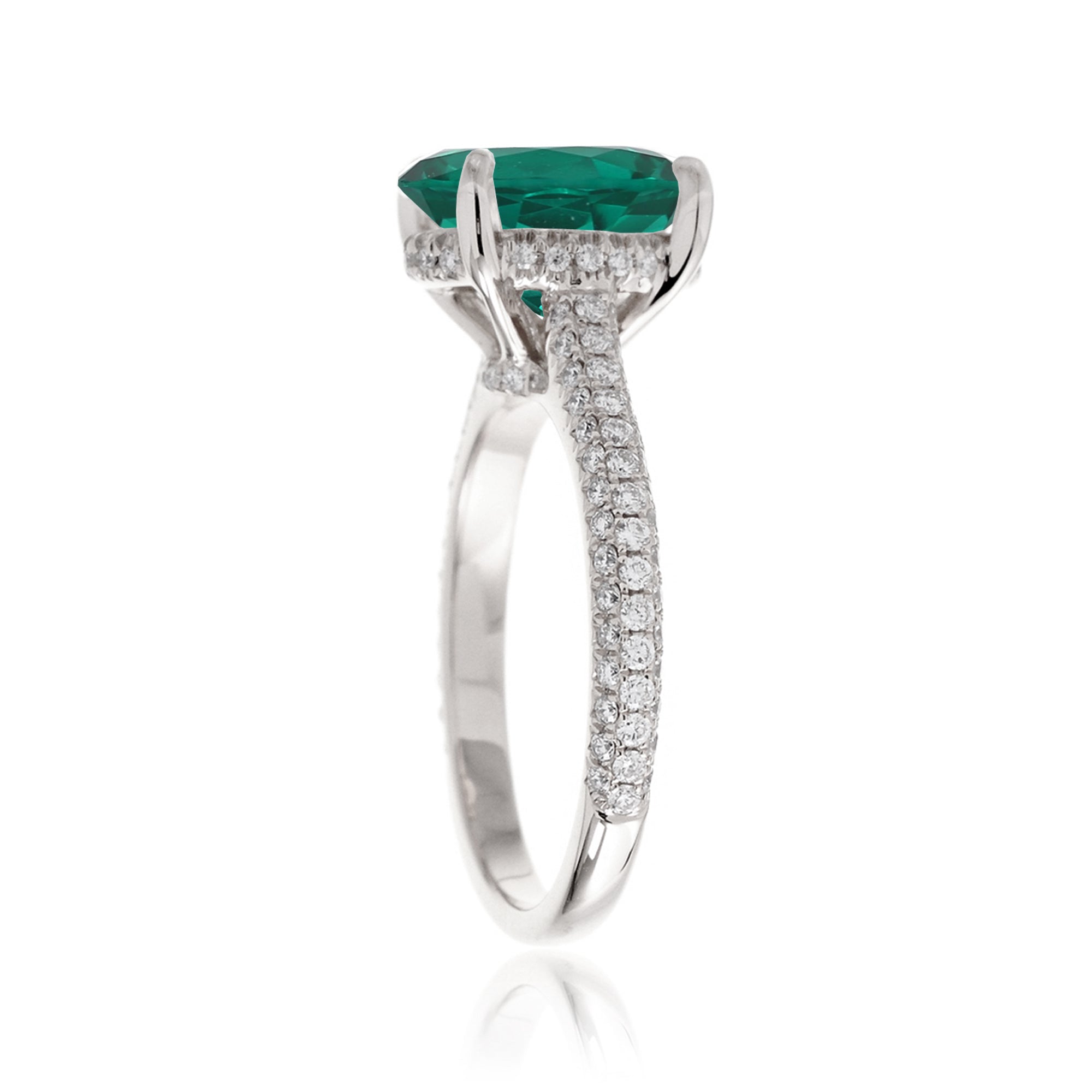 Green Emerald and Diamond Ring – Oval Cut with Triple Diamond Shank