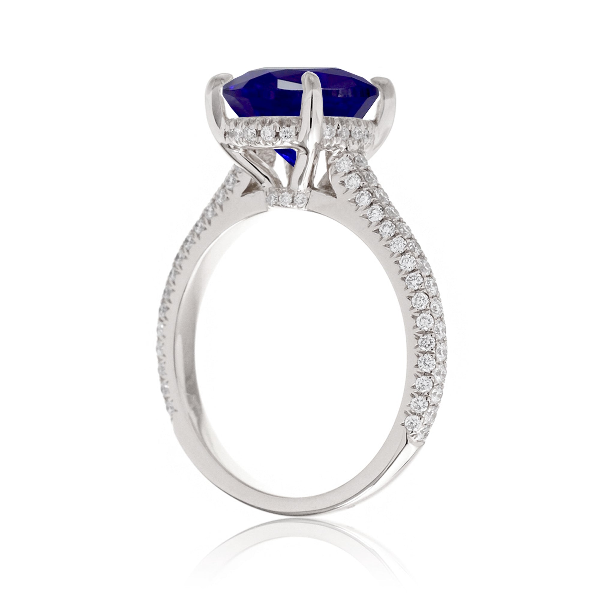 Oval Cut Blue Sapphire and Diamond Ring with Triple Pavé Band