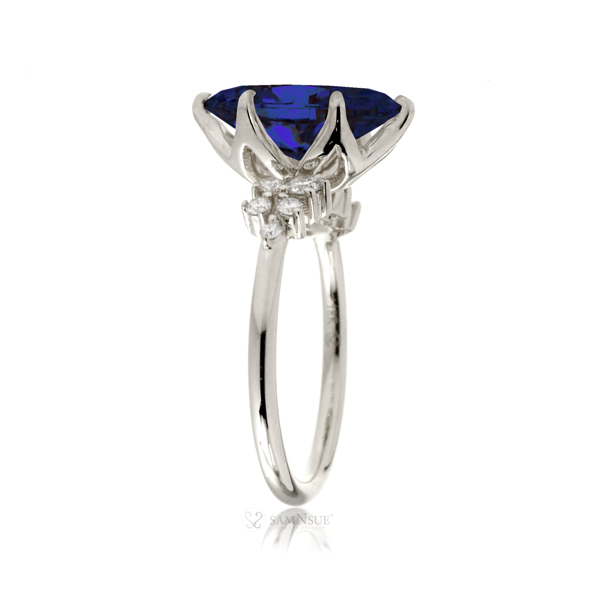 The Stella Marquise Cut Blue Sapphire And Diamond Ring