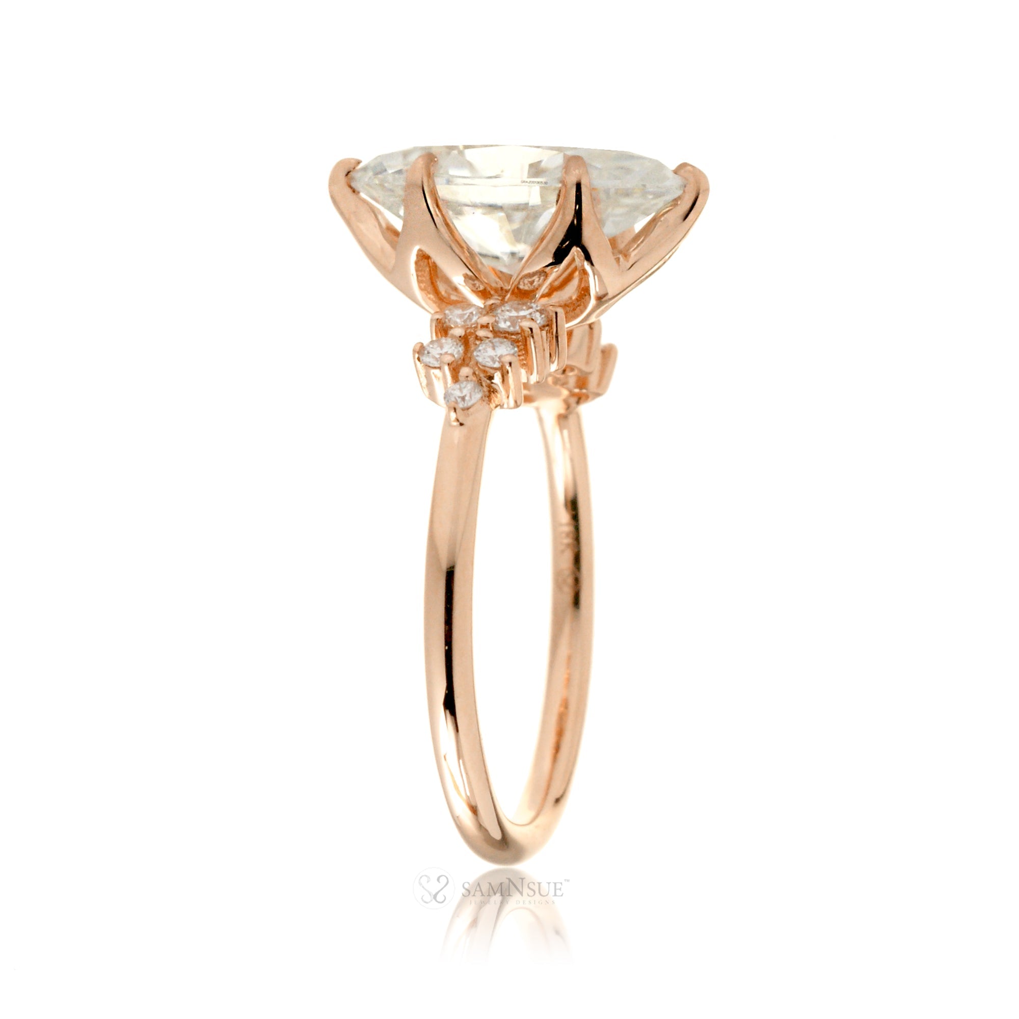 Marquise cut moissanite crown basket and diamond side stone ring rose gold