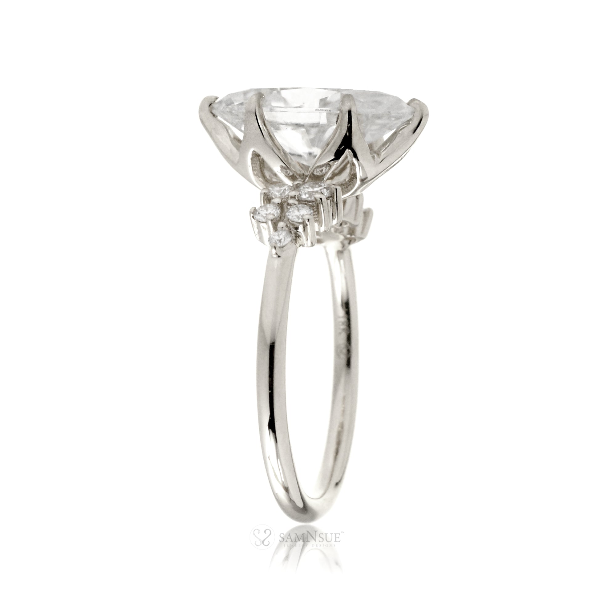 Marquise cut moissanite crown basket and diamond side stone ring white gold