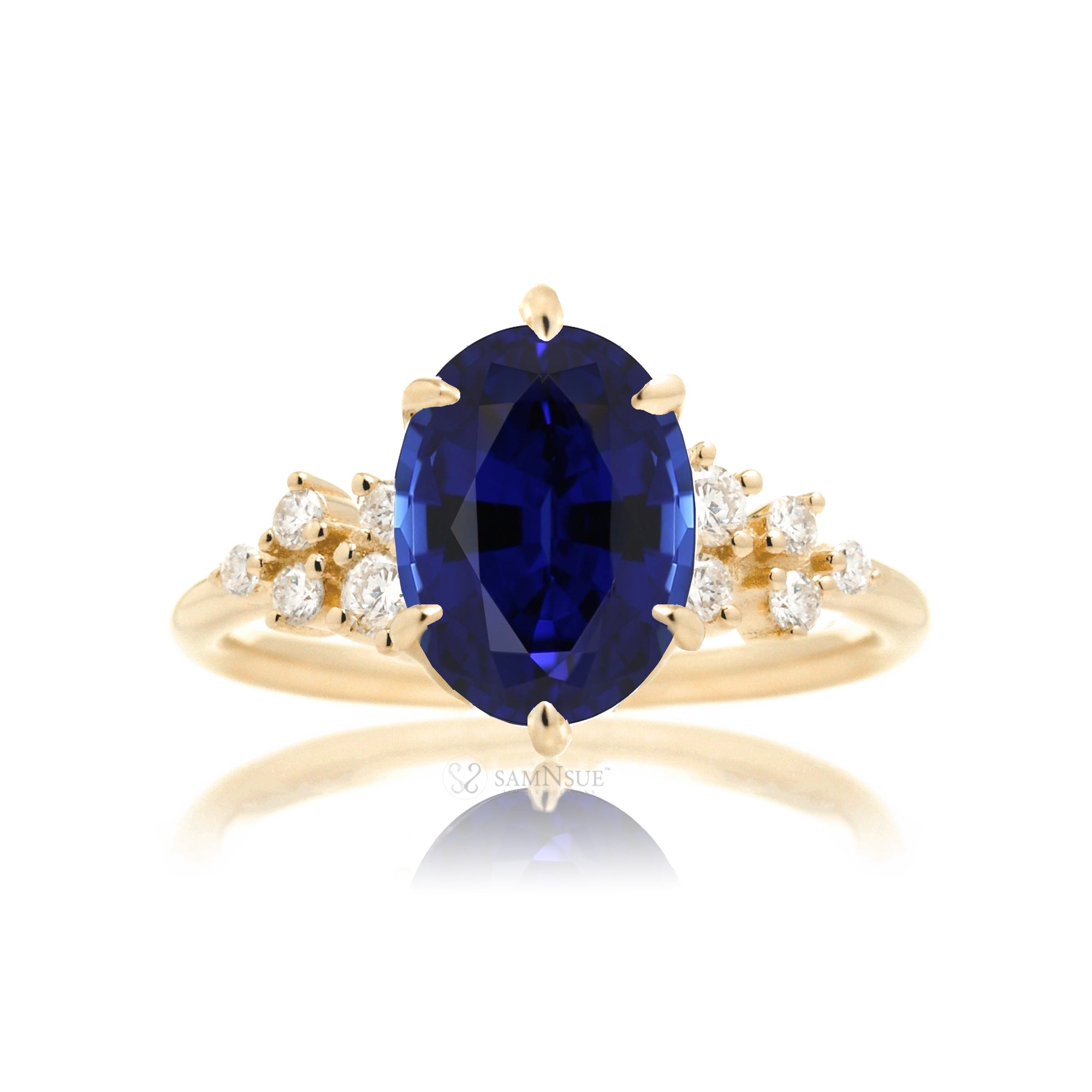 Blue sapphire oval cut solitaire engagement ring in yellow gold