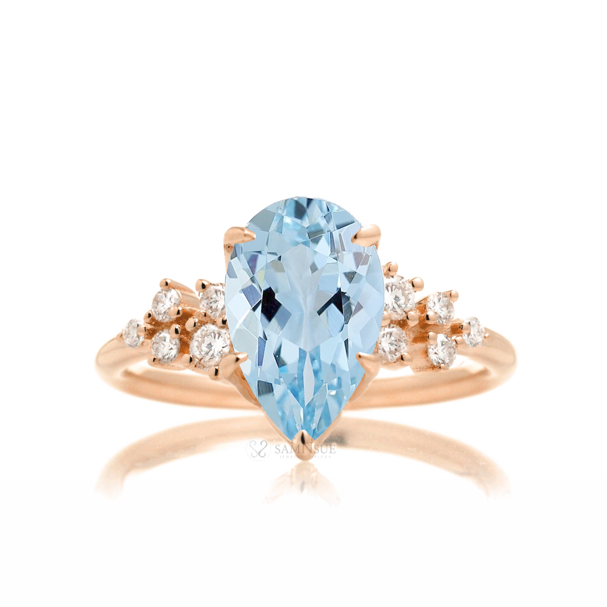 Pear aquamarine diamond three stone ring rose gold