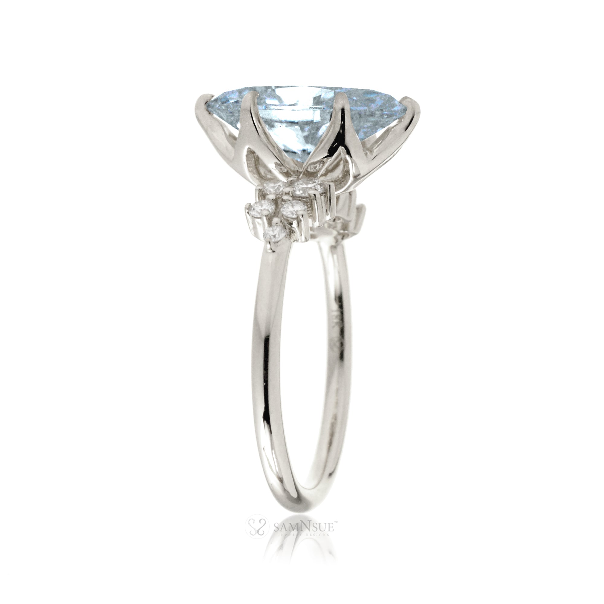 Pear aquamarine diamond three stone ring white gold