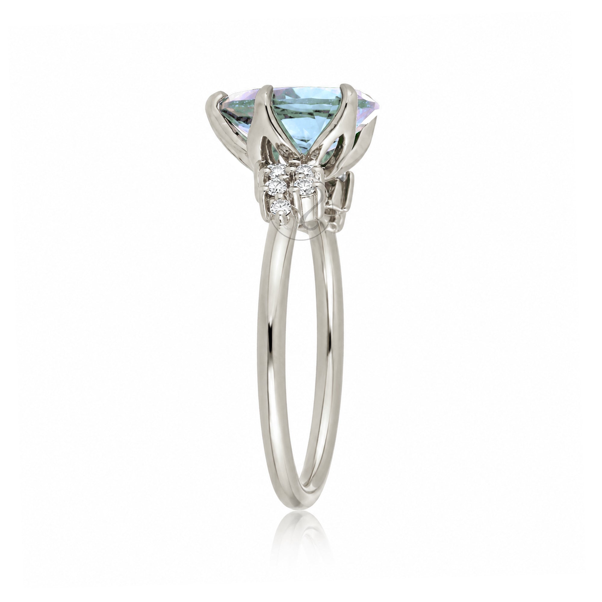 Pear aquamarine diamond three stone ring white gold
