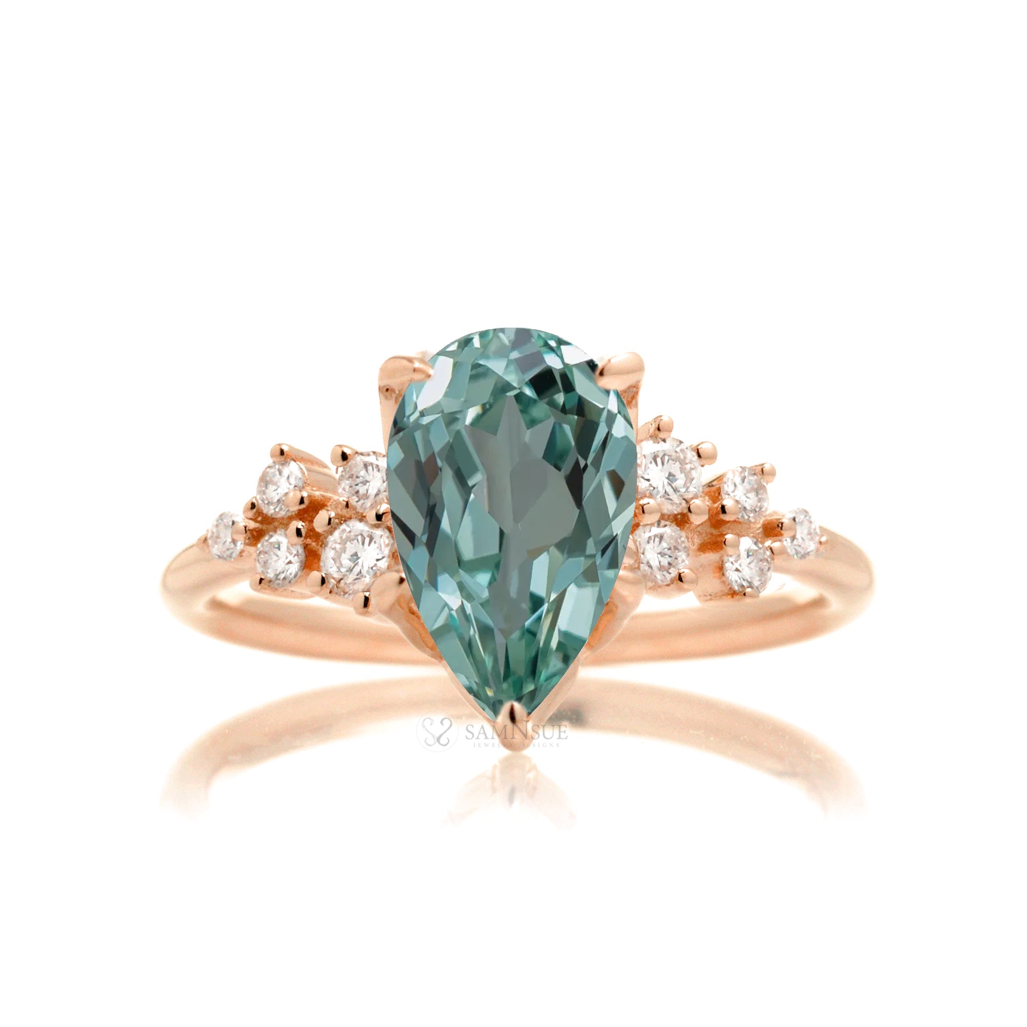 Green sapphire ring pear cut diamond three stone ring rose gold