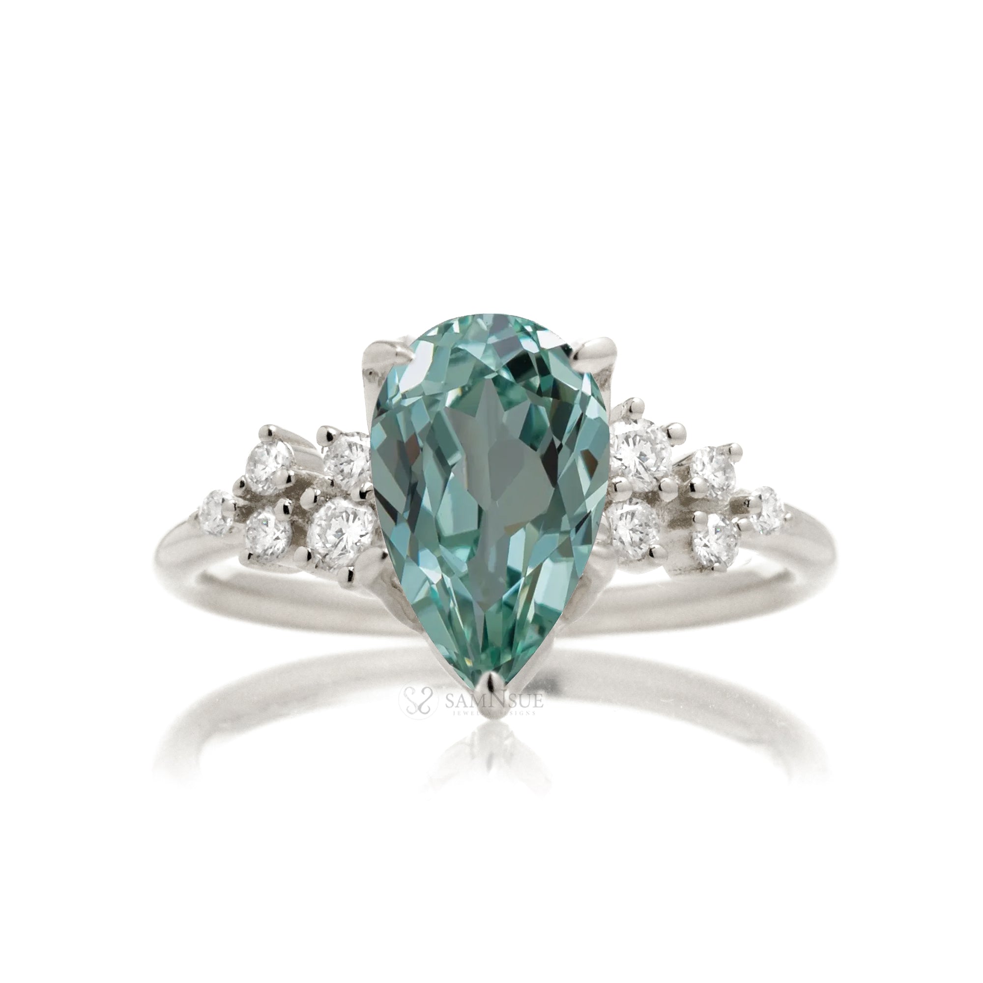 Green sapphire ring pear cut diamond three stone ring white gold