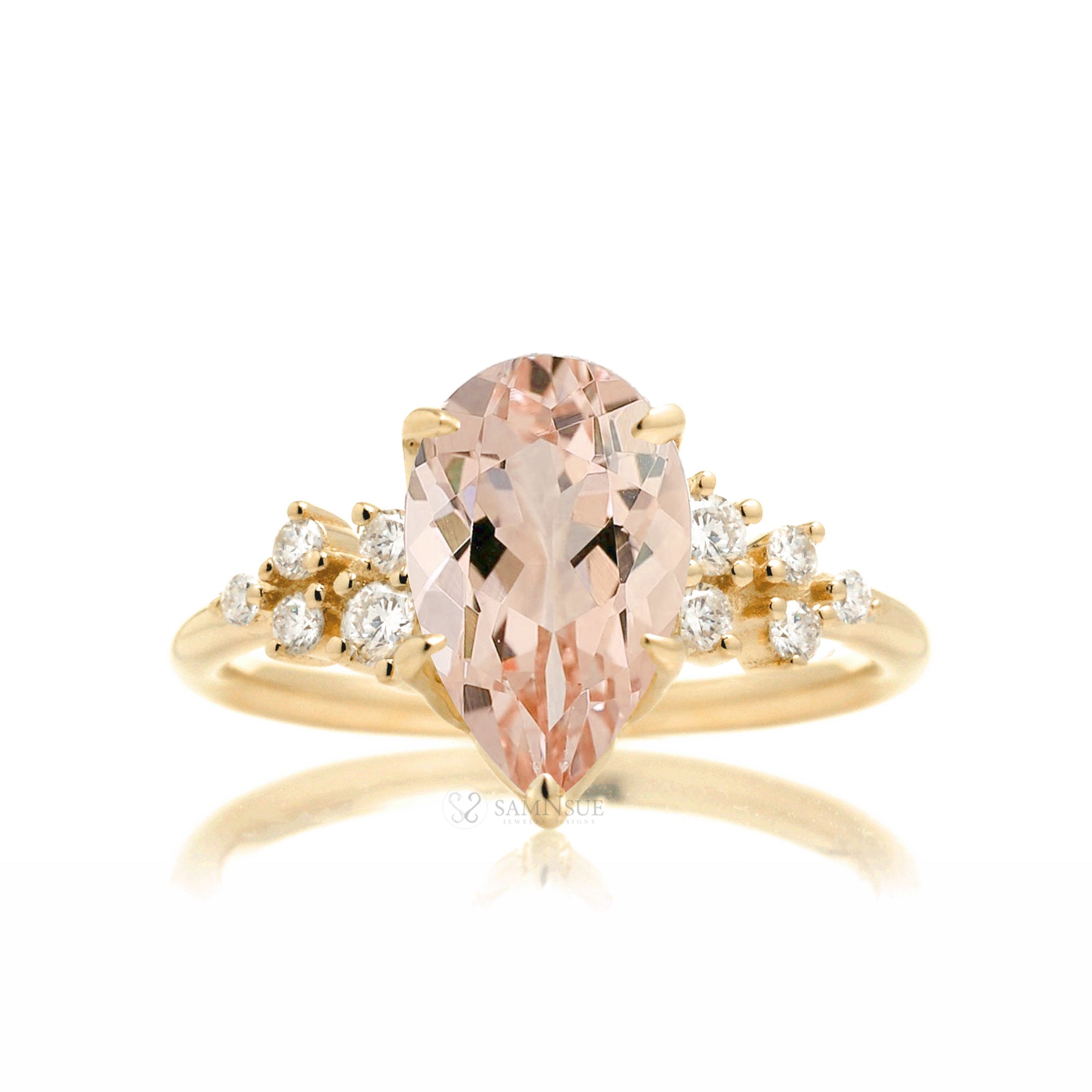 Pear morganite three stone diamond ring yellow gold