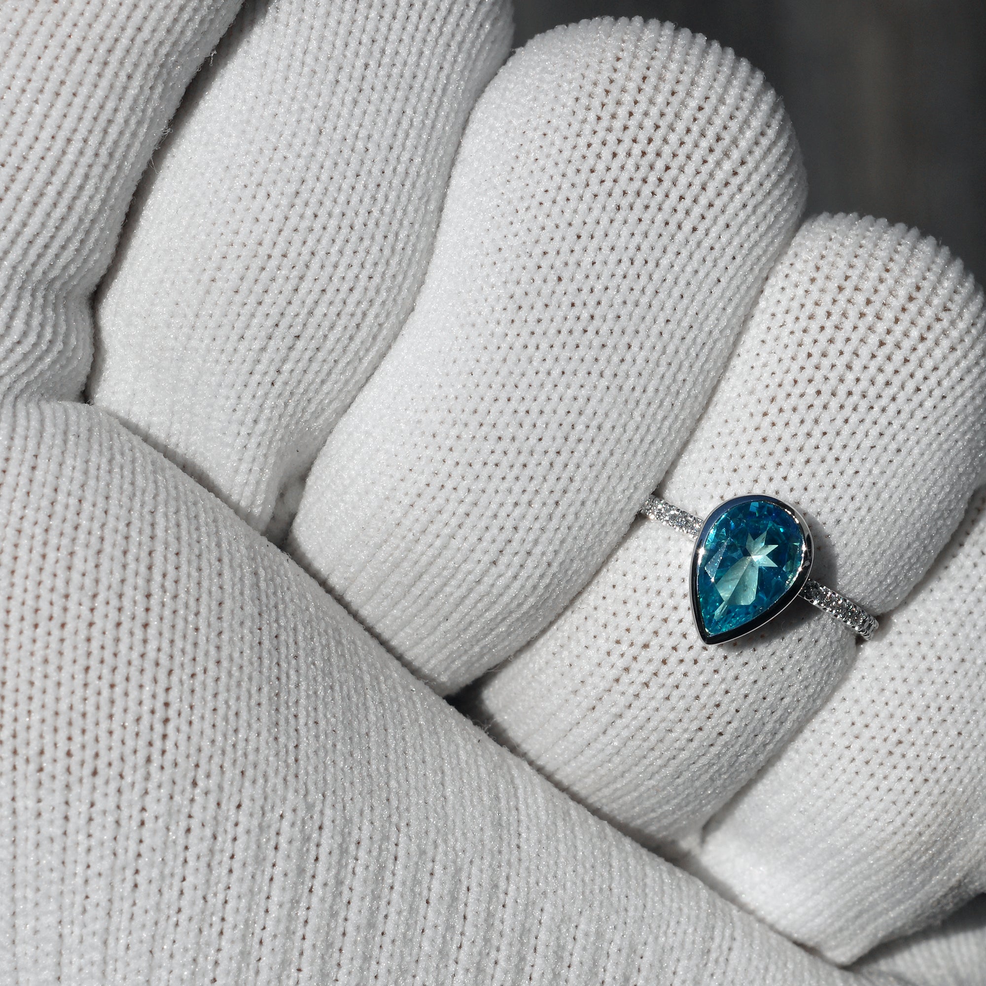 Blue topaz ring pear cut bezel set diamond band ring white gold