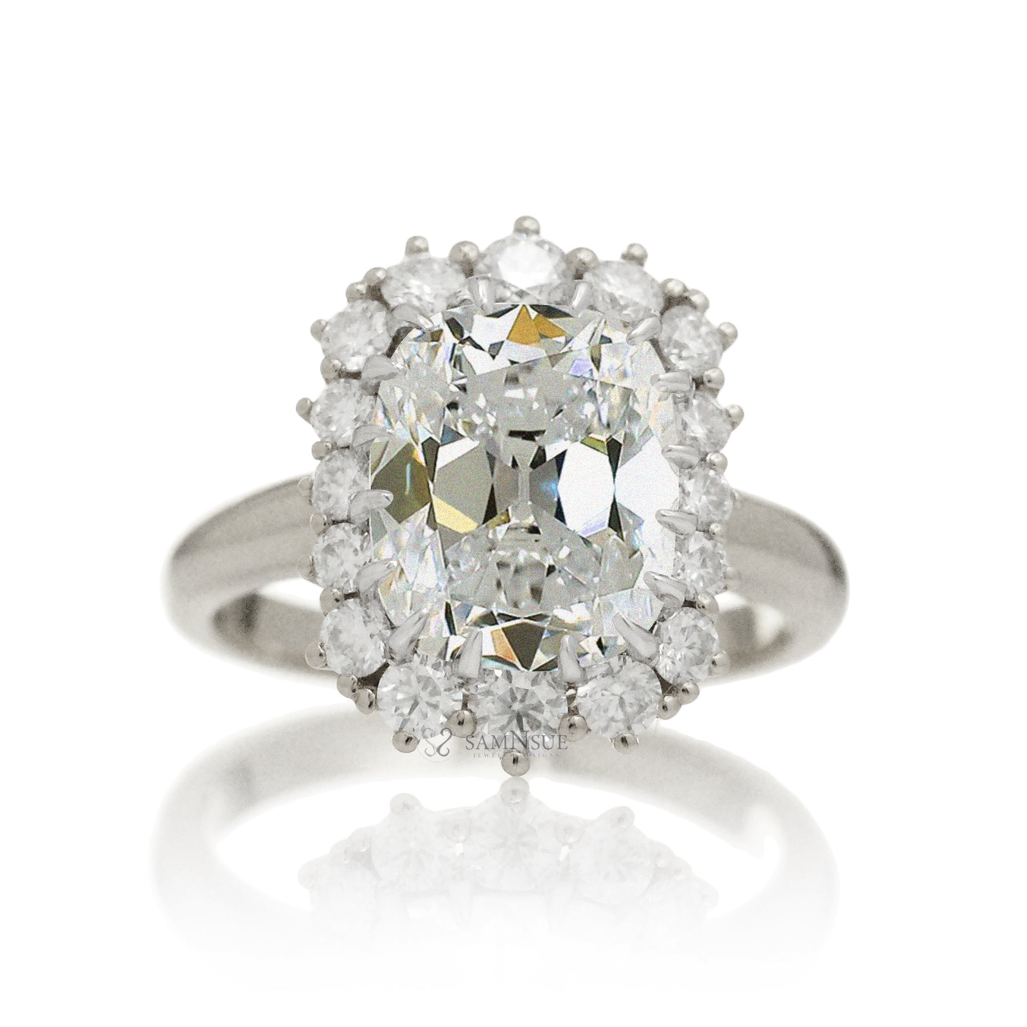 Old mine cut diamond and halo vintage style ring white gold