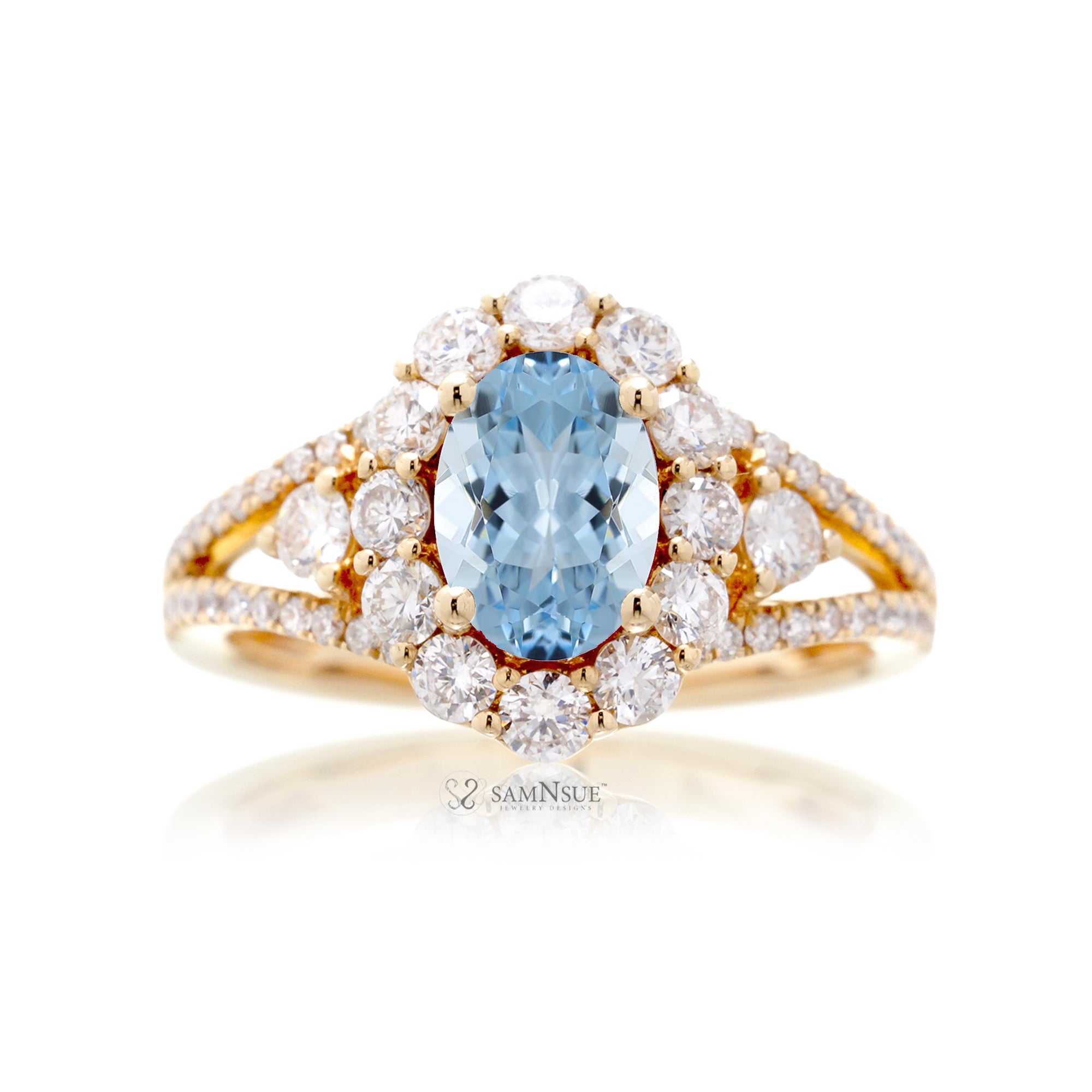 Oval cut aquamarine diamond halo split band three stone ring yellow gold