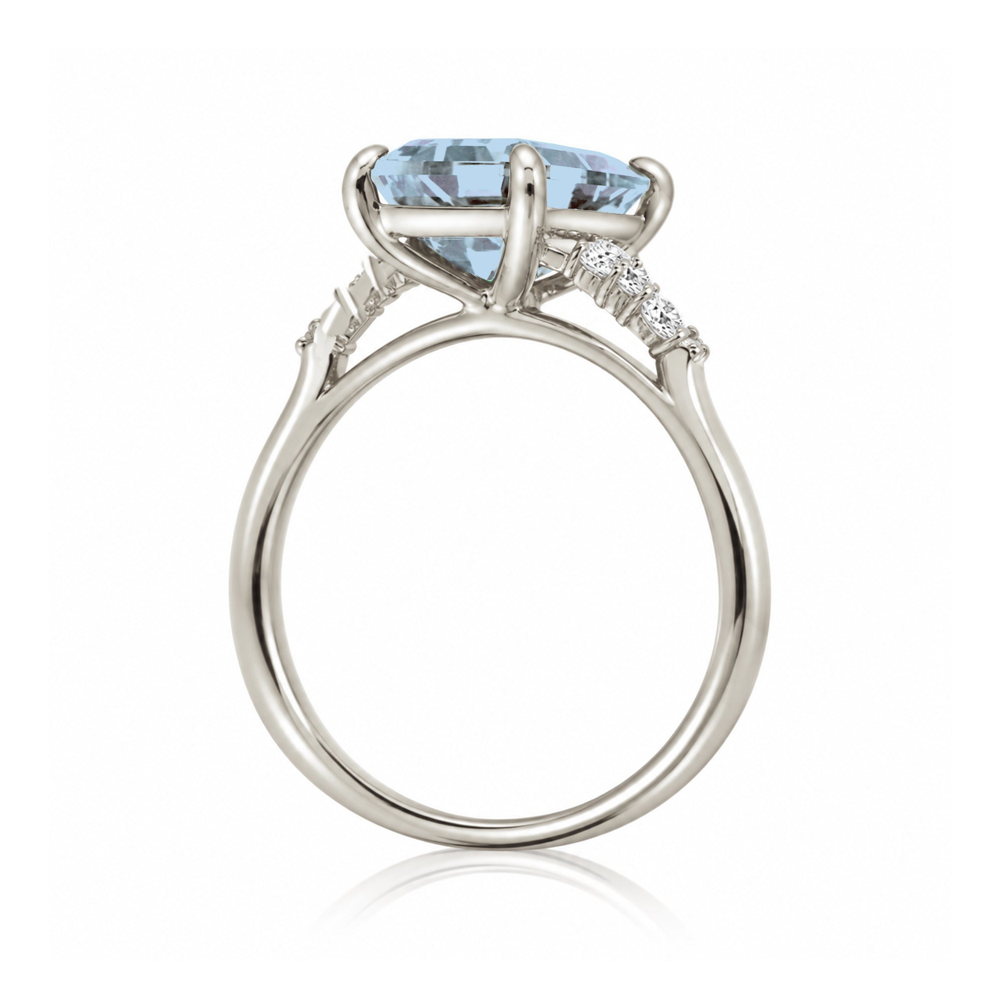 Aquamarine ring emerald cut with solid rounded band in white gold