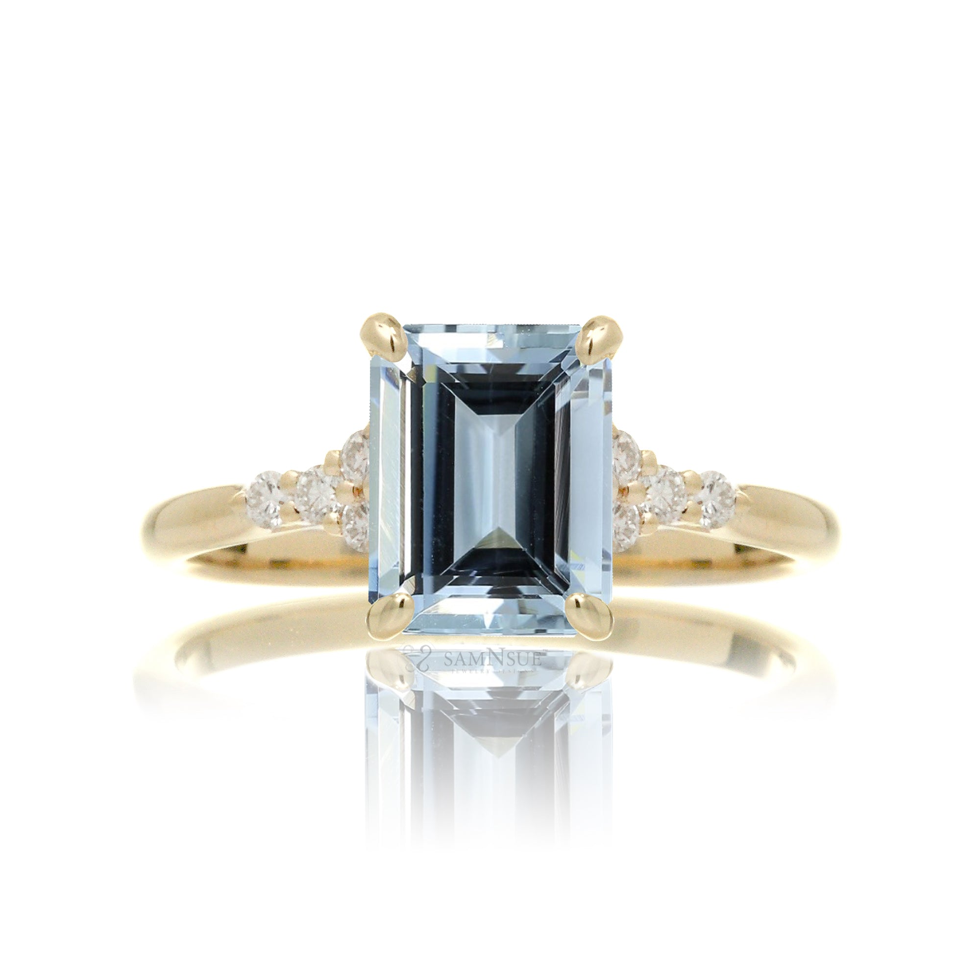 Aquamarine ring emerald cut with solid rounded band in yellow gold