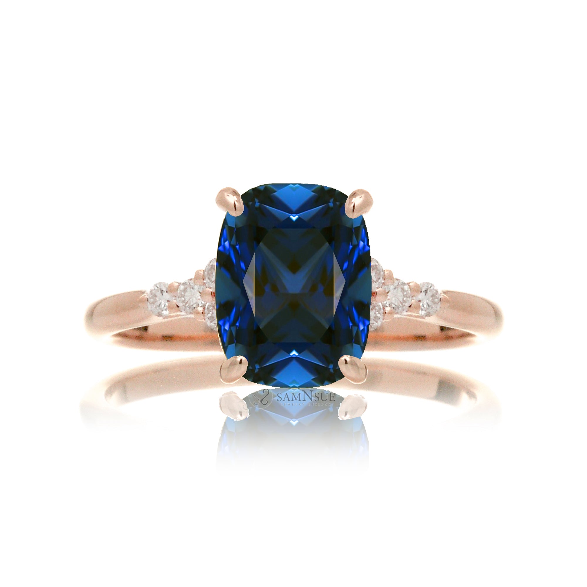 Cushion cut diamond three stone ring rose gold