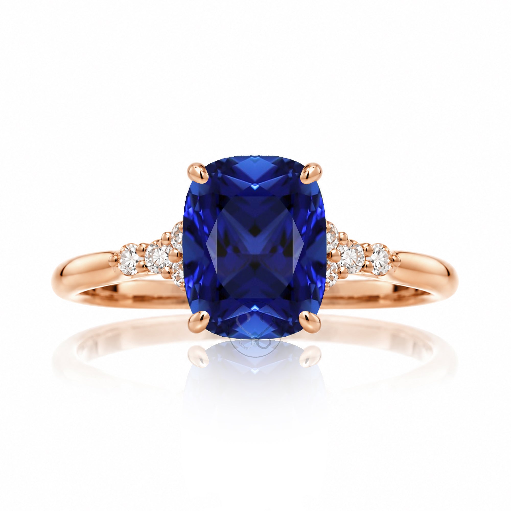 Cushion cut diamond three stone ring rose gold