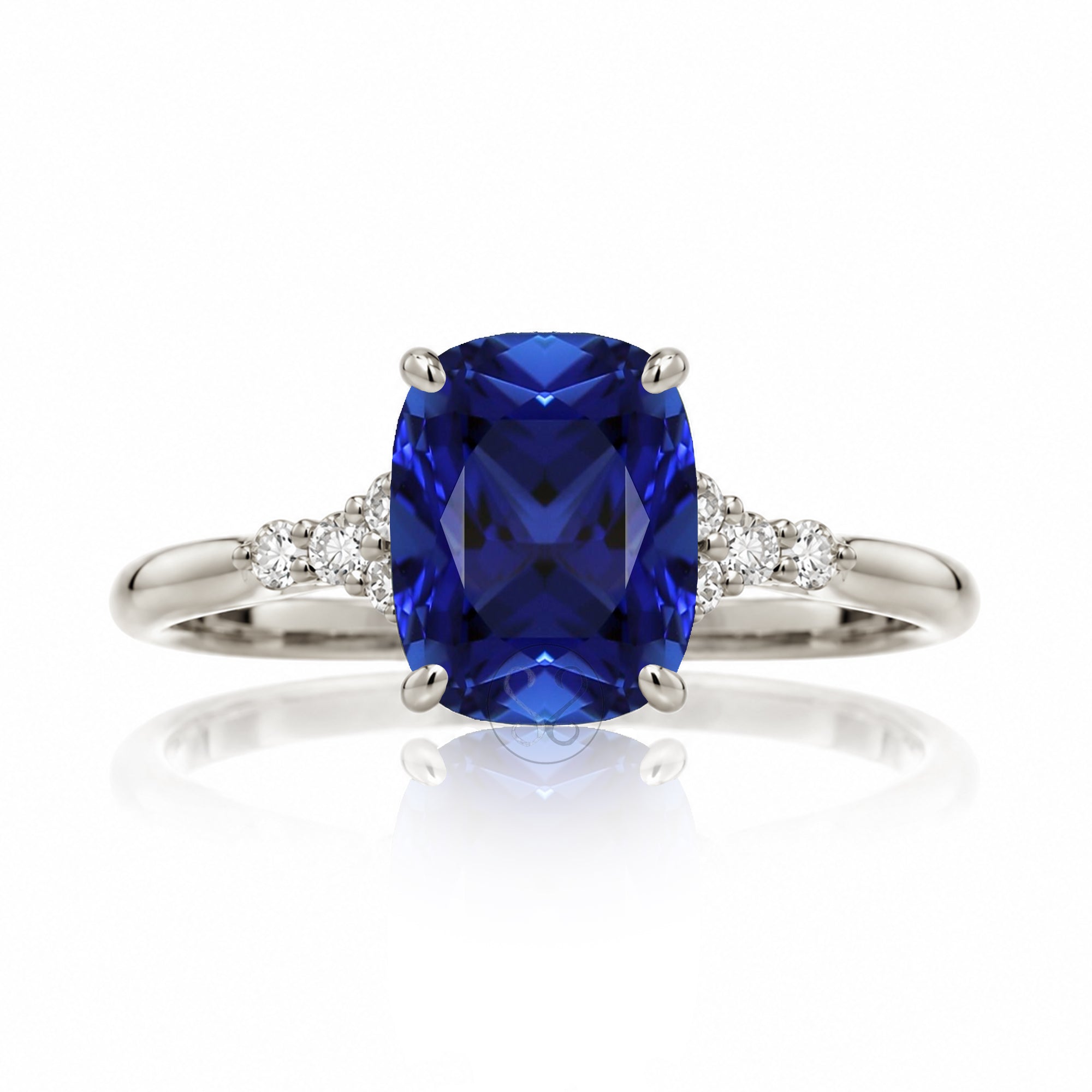Cushion cut diamond three stone ring white gold