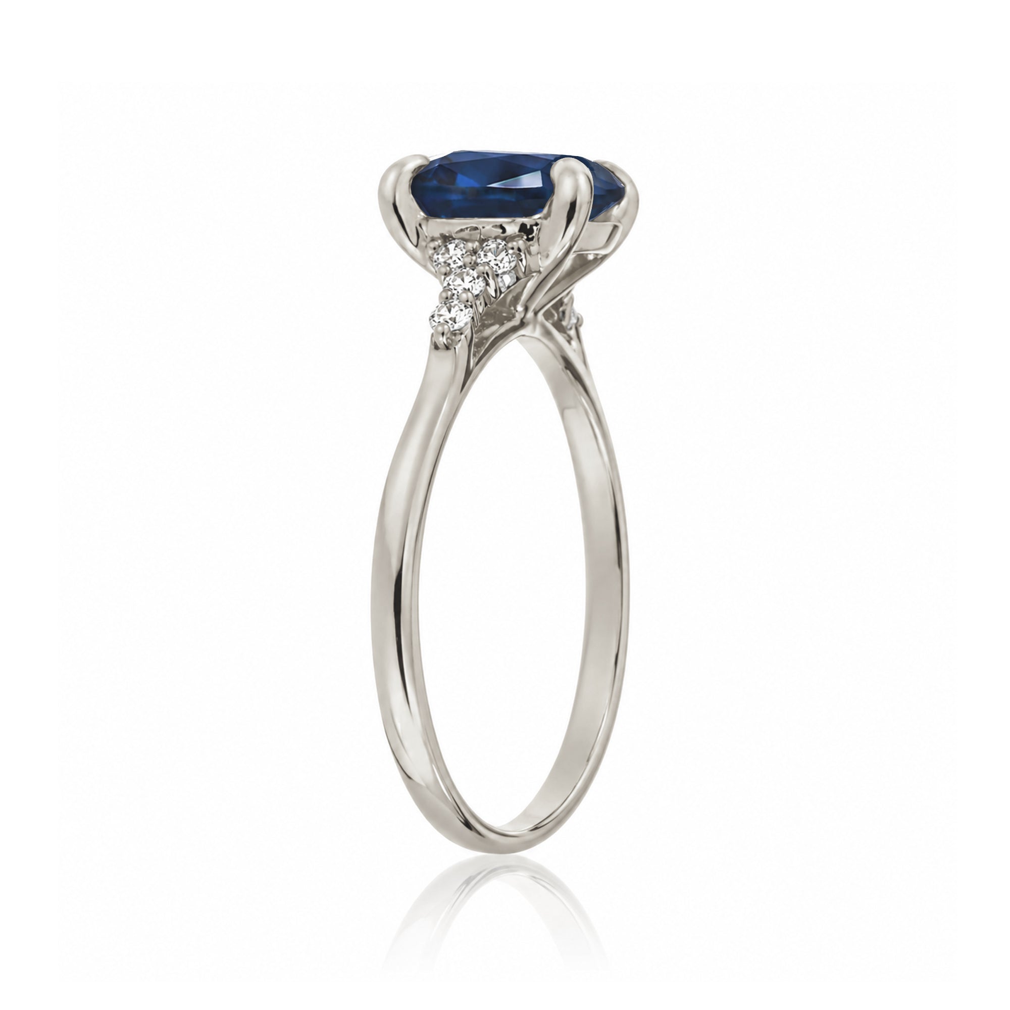Cushion cut diamond three stone ring white gold