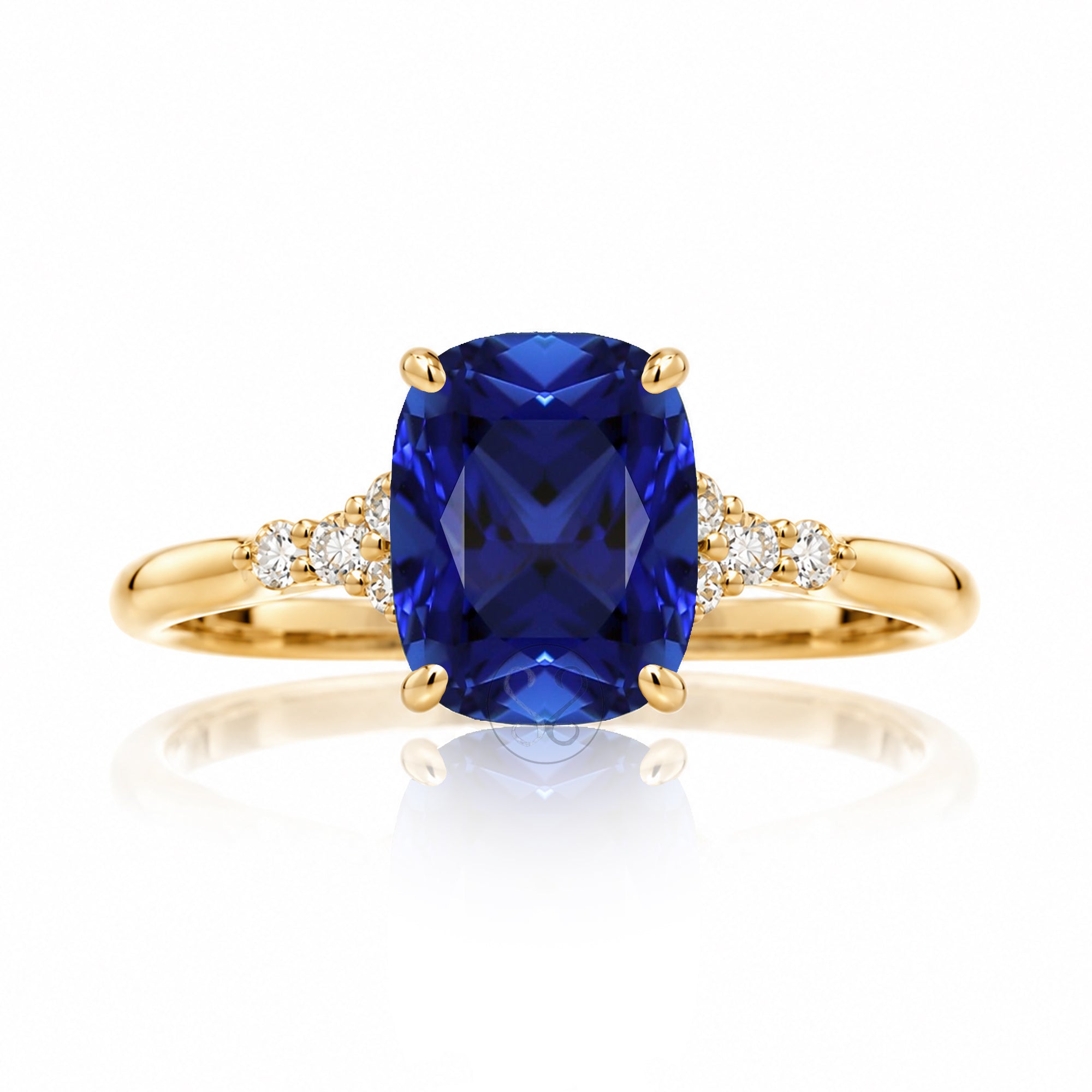 Cushion cut diamond three stone ring yellow gold