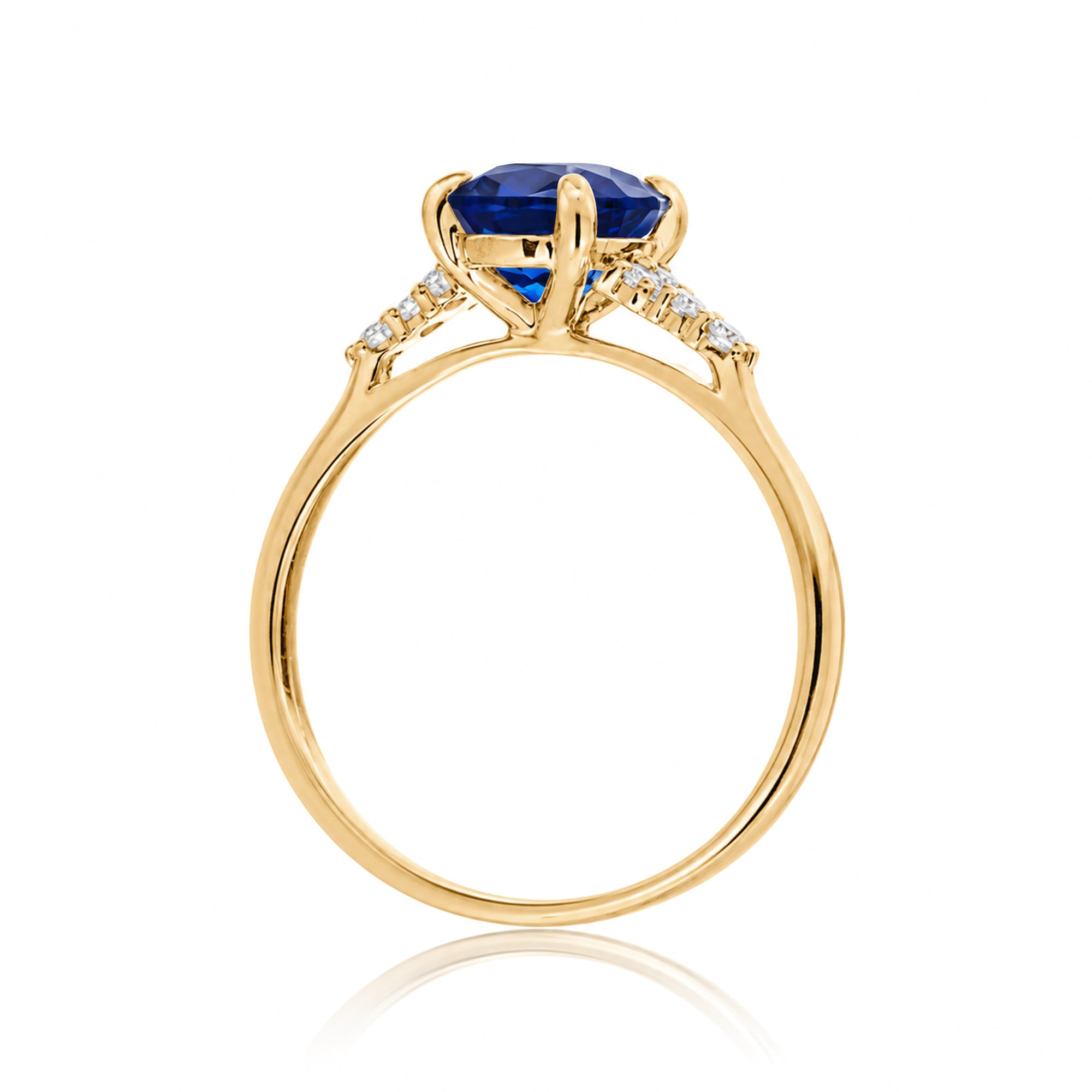 Cushion cut diamond three stone ring yellow gold