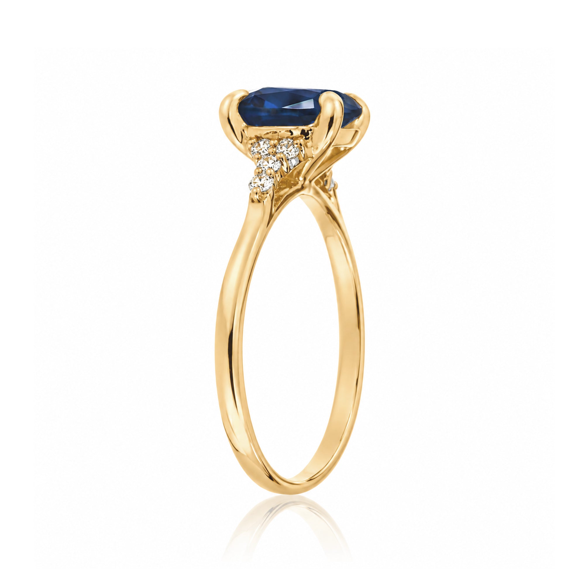 Cushion cut diamond three stone ring yellow gold