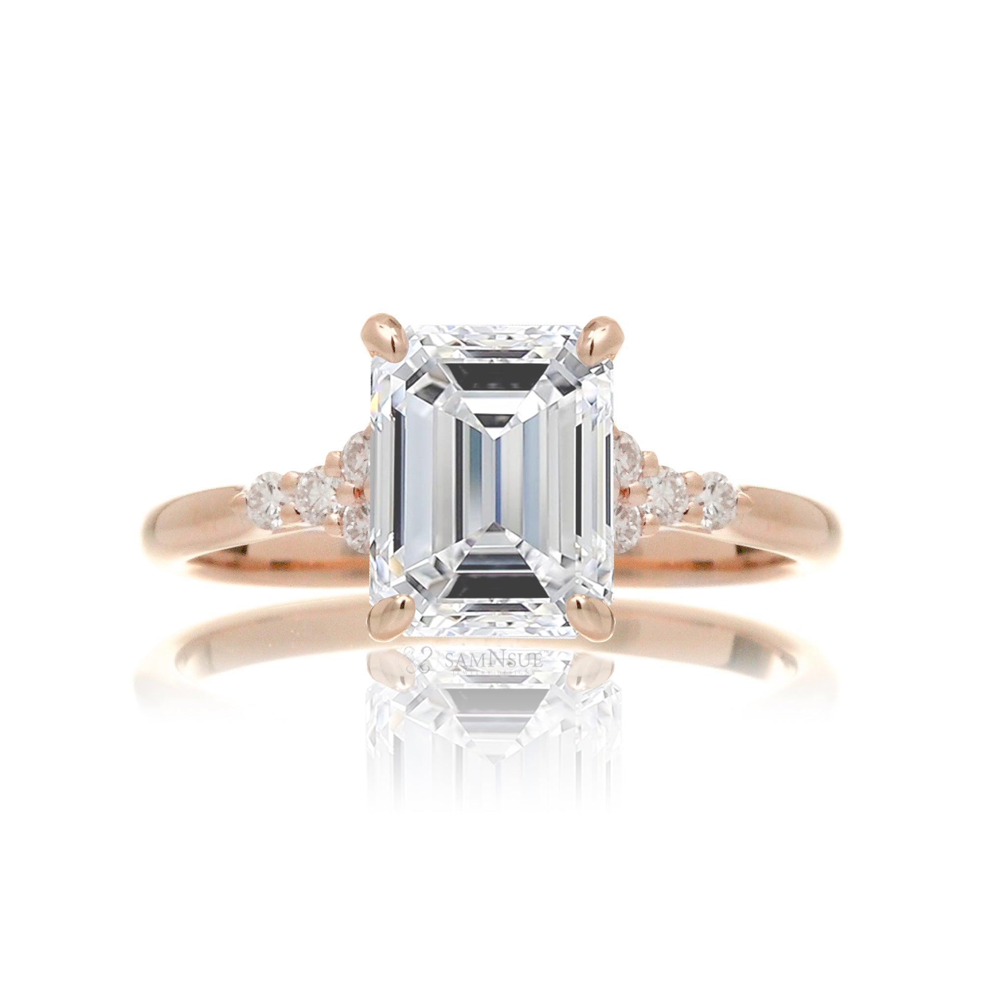 Emerald step cut diamond engagement ring in rose gold