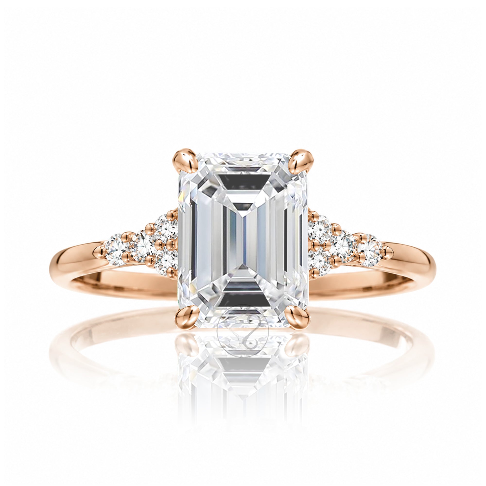 Emerald step cut diamond engagement ring in rose gold