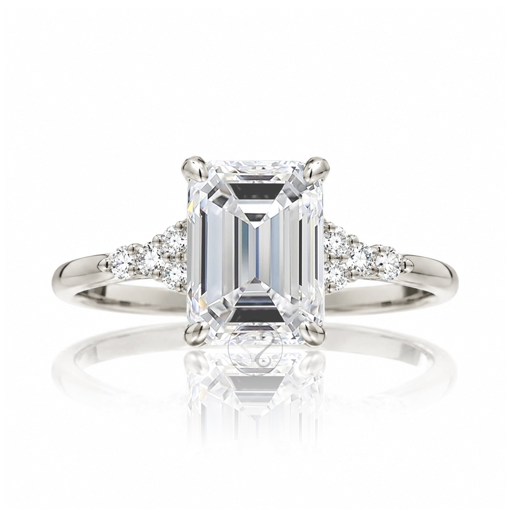 Emerald step cut diamond engagement ring in white gold