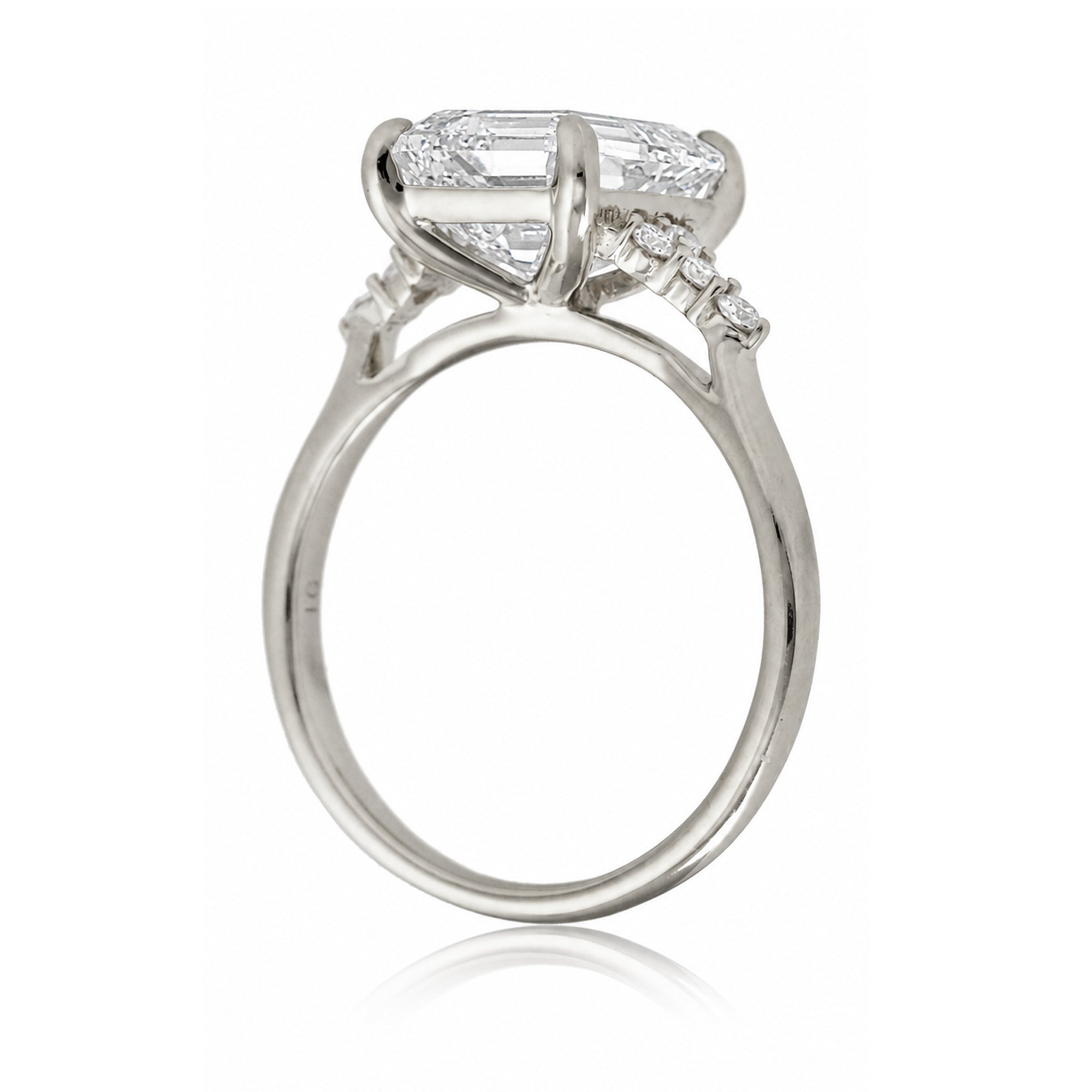 Emerald step cut diamond engagement ring in white gold