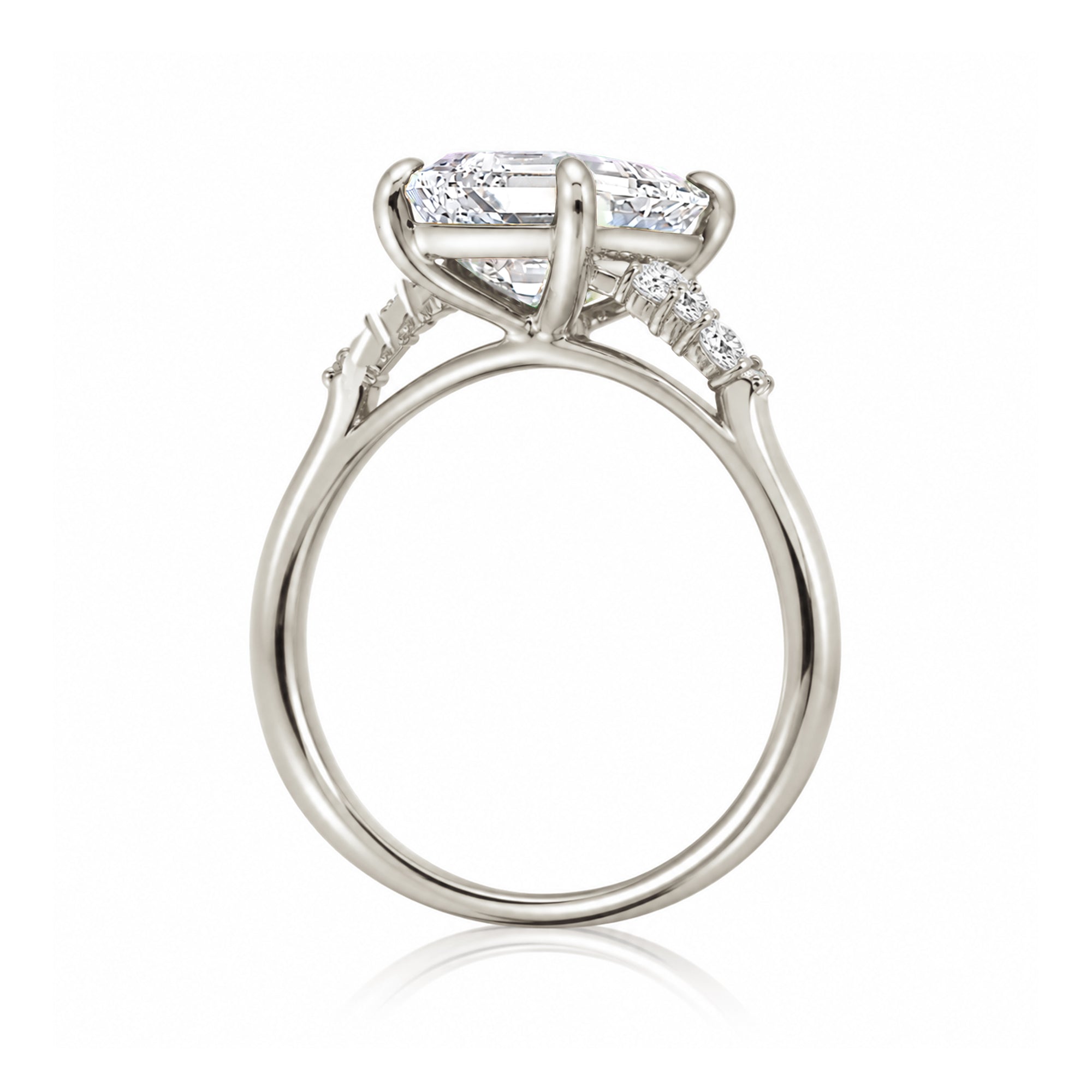 Emerald step cut diamond engagement ring in white gold