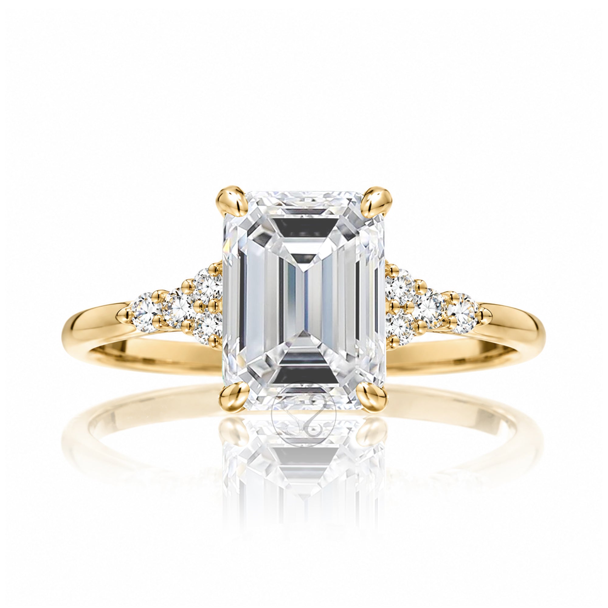 Emerald step cut diamond engagement ring in yellow gold