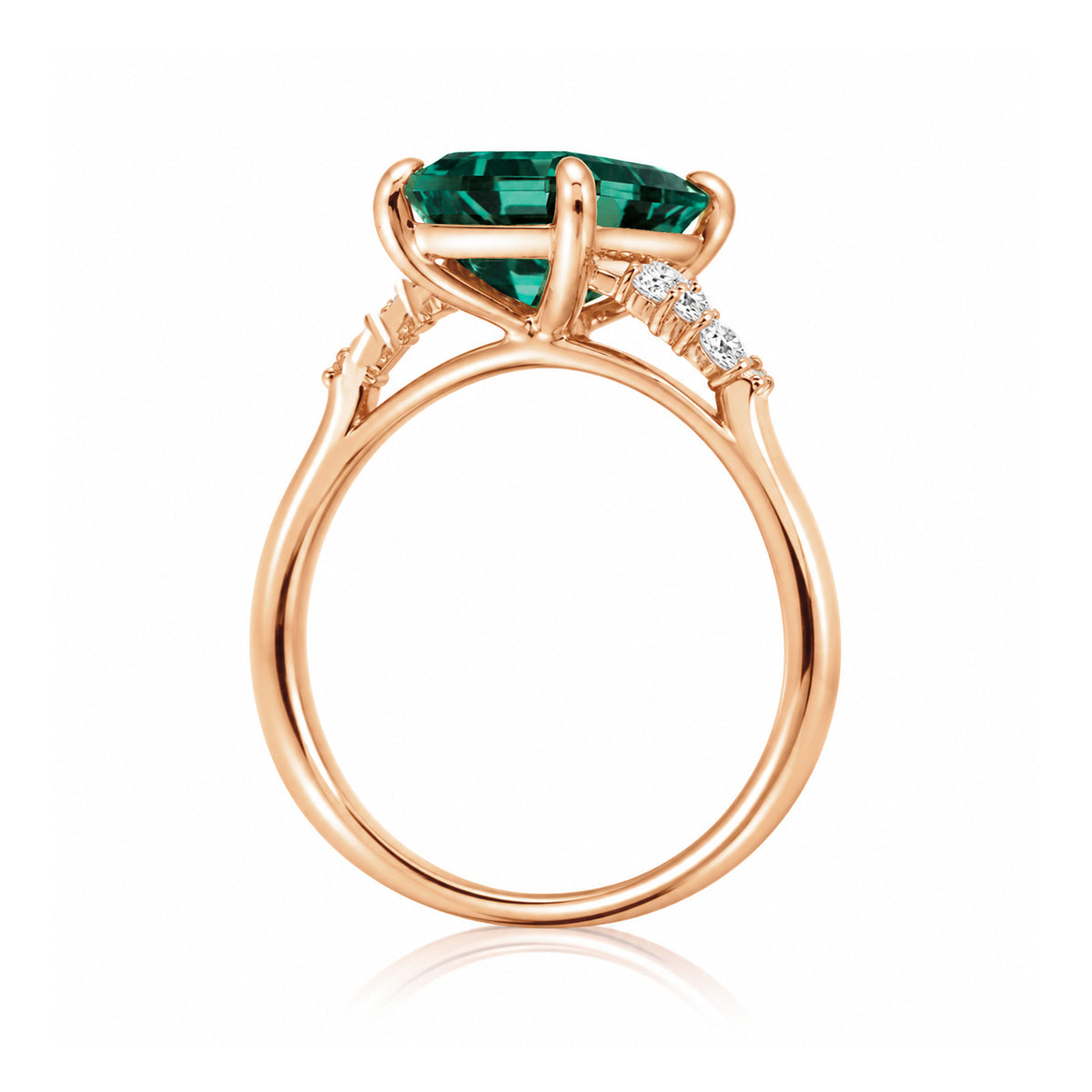 Green emerald engagement three stone ring in rose gold the Chloe