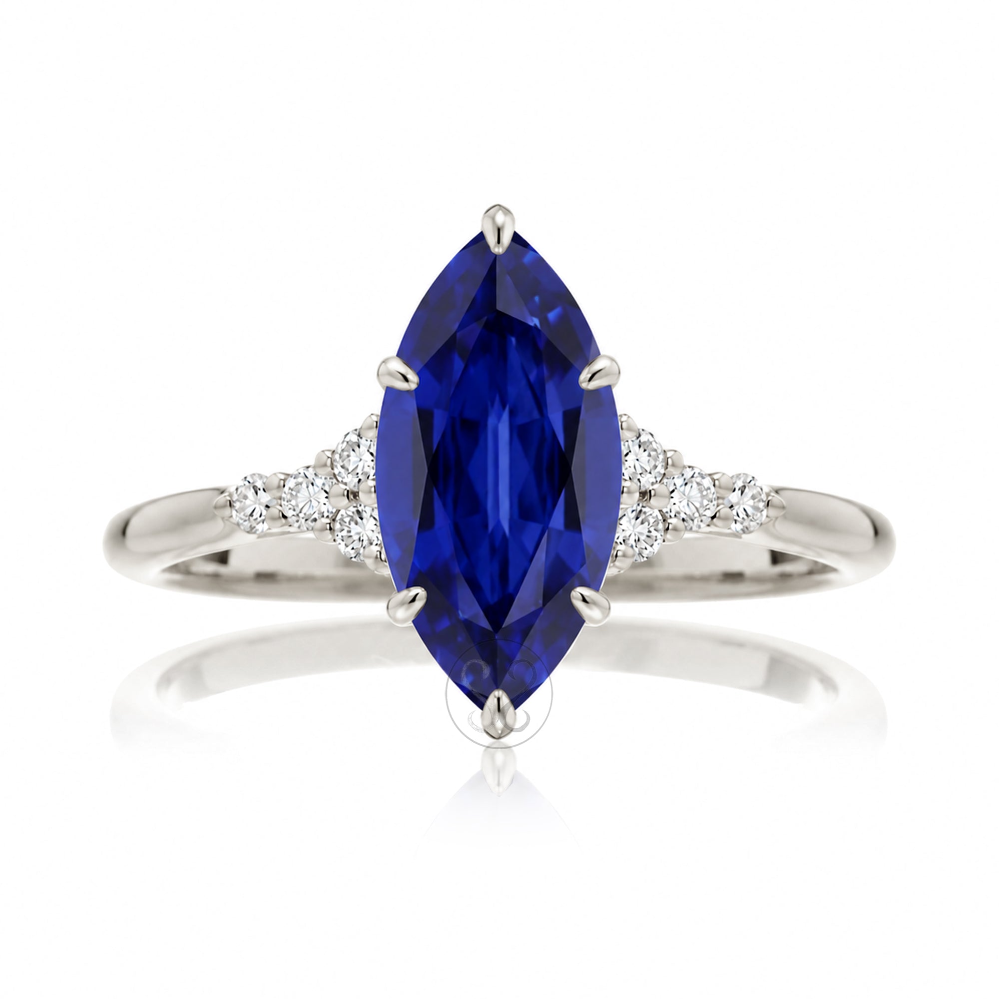 Marquise sapphire diamond three stone engagement ring in white gold