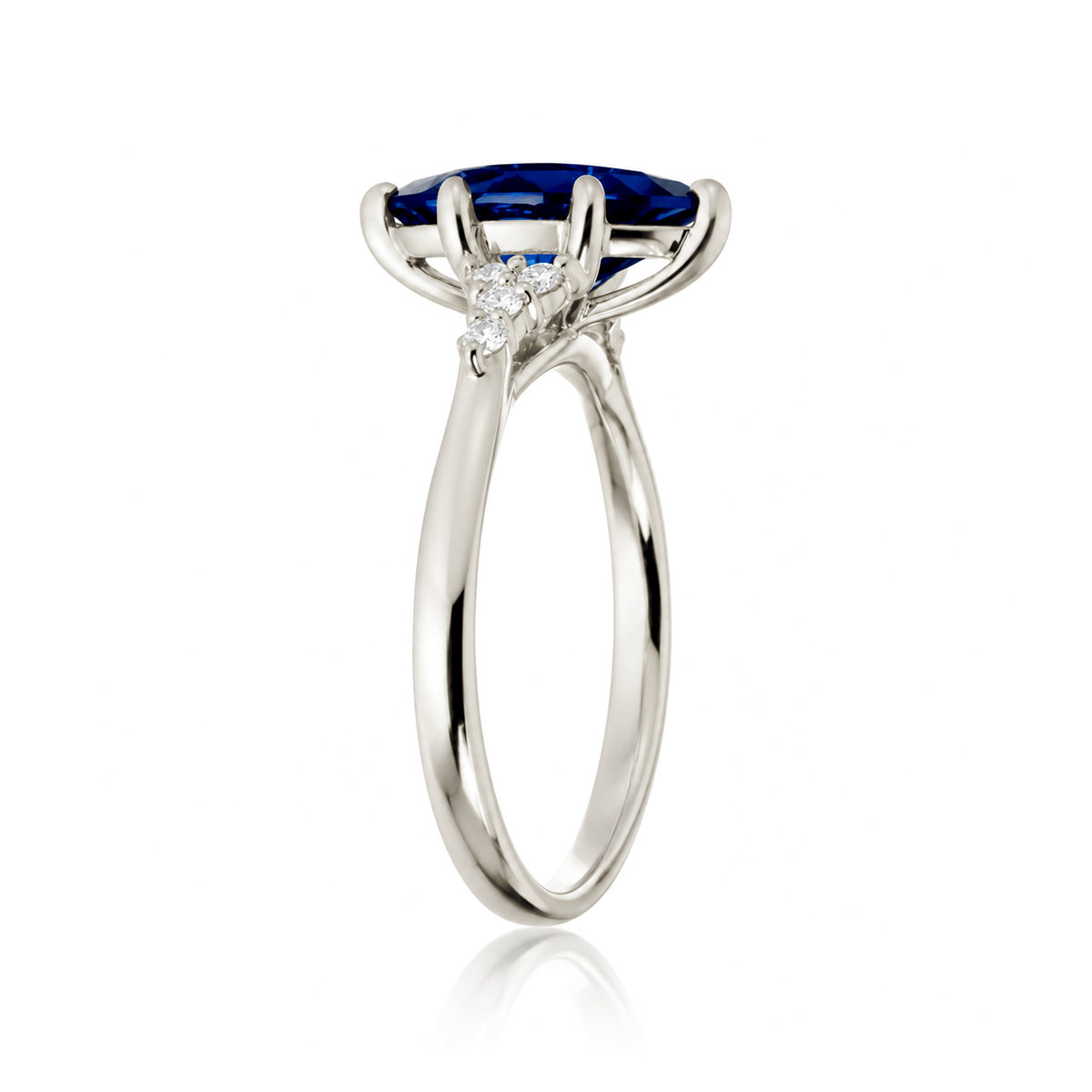 Marquise sapphire diamond three stone engagement ring in white gold