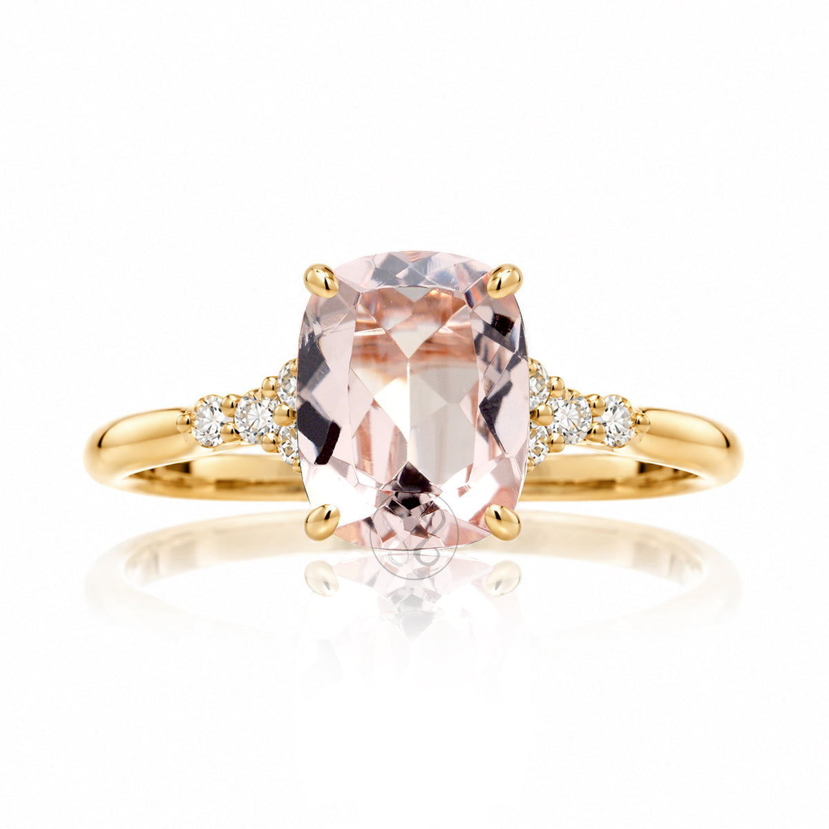 Cushion morganite ring with solid band and diamond accent in yellow gold