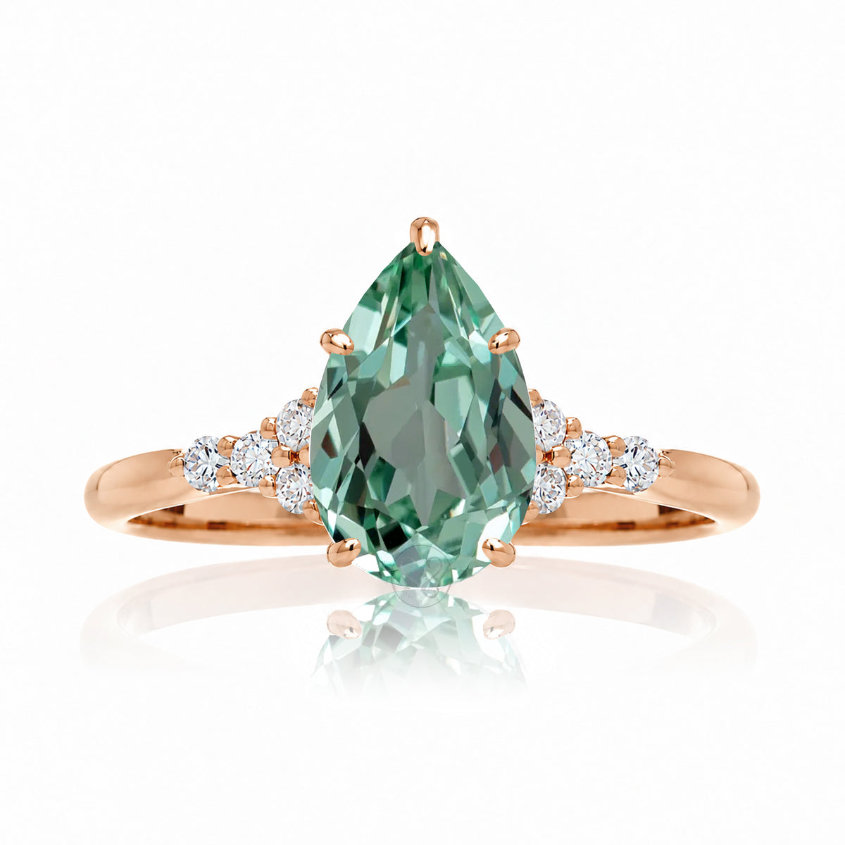 Pear cut green sapphire and diamond engagement ring in rose gold - the Chloe lab-grown