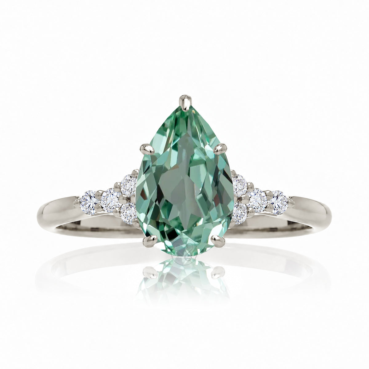 Pear cut green sapphire and diamond engagement ring in white gold - the Chloe lab-grown