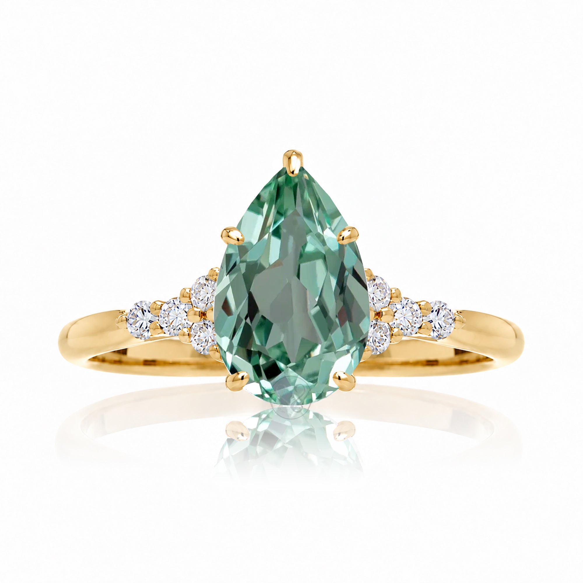 Pear cut green sapphire and diamond engagement ring in yellow gold - the Chloe lab-grown