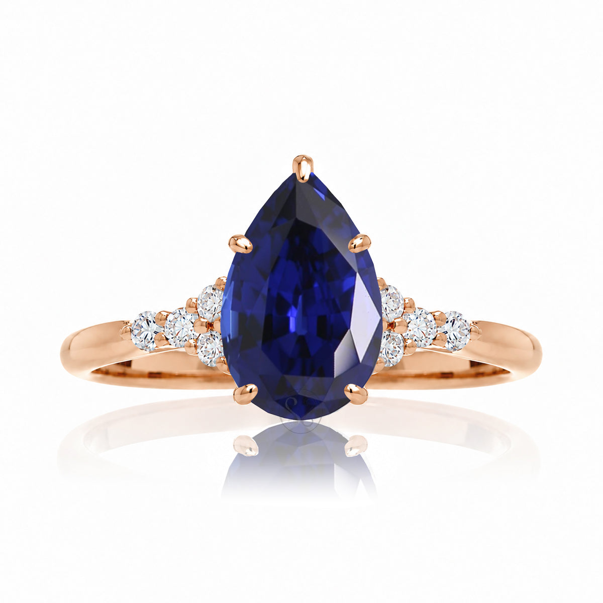 Pear shape blue sapphire diamond ring in rose gold - the Chloe lab-grown