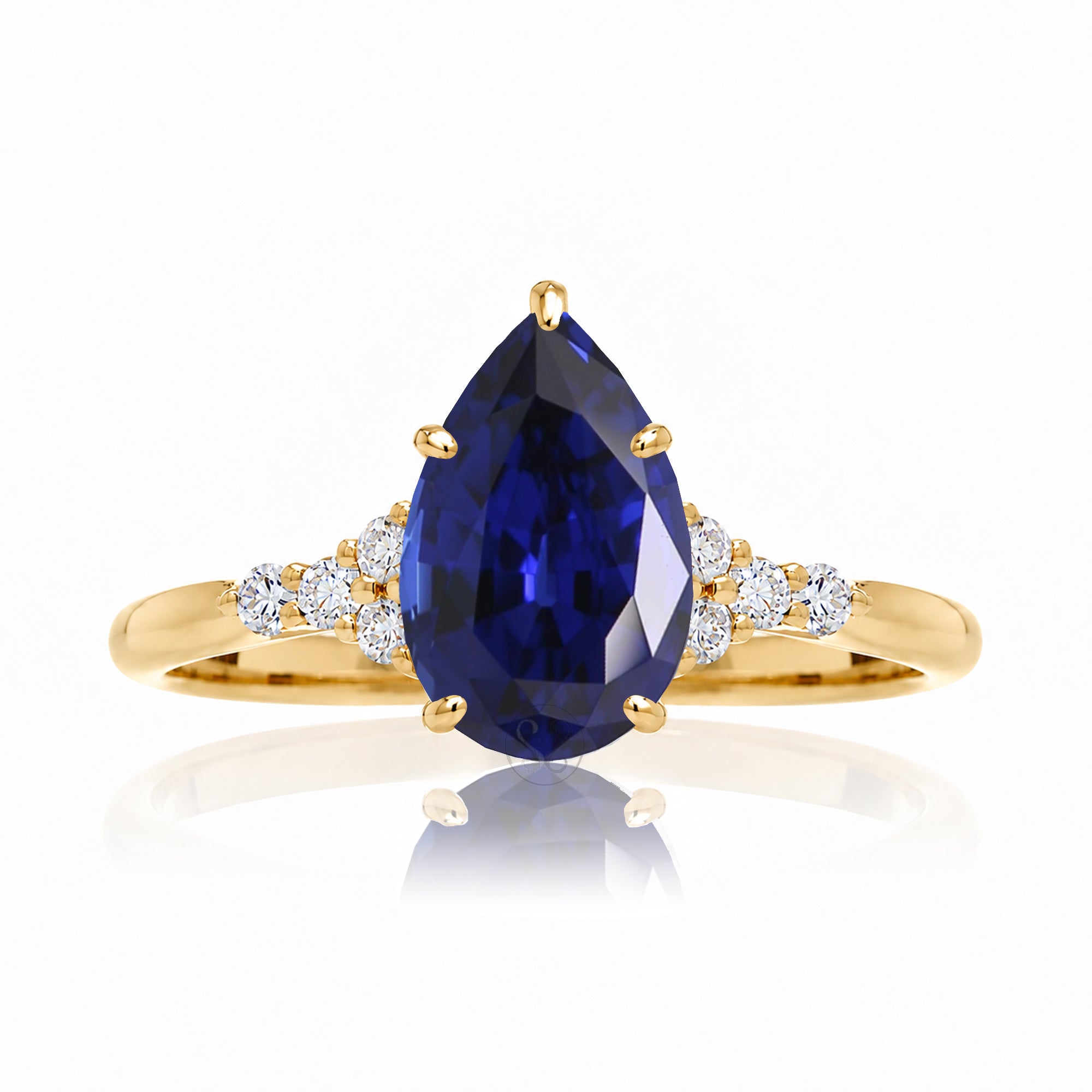 Pear shape blue sapphire diamond ring in yellow gold - the Chloe lab-grown